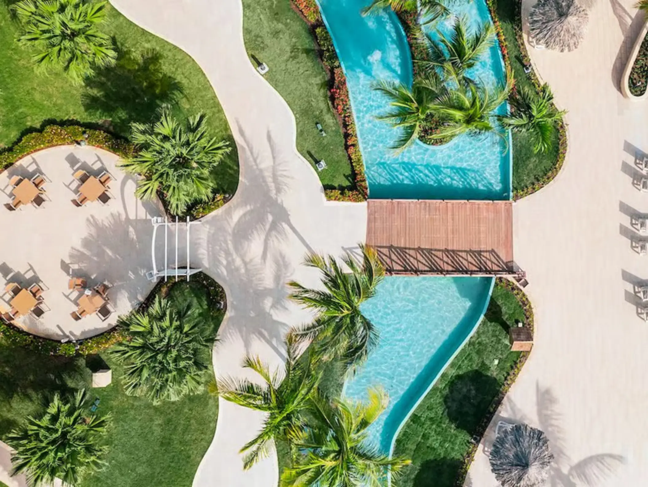 Aerial view of Calypso Terrace venue and winding pool at Iberostar Waves Rose Hall Beach, Montego Bay
