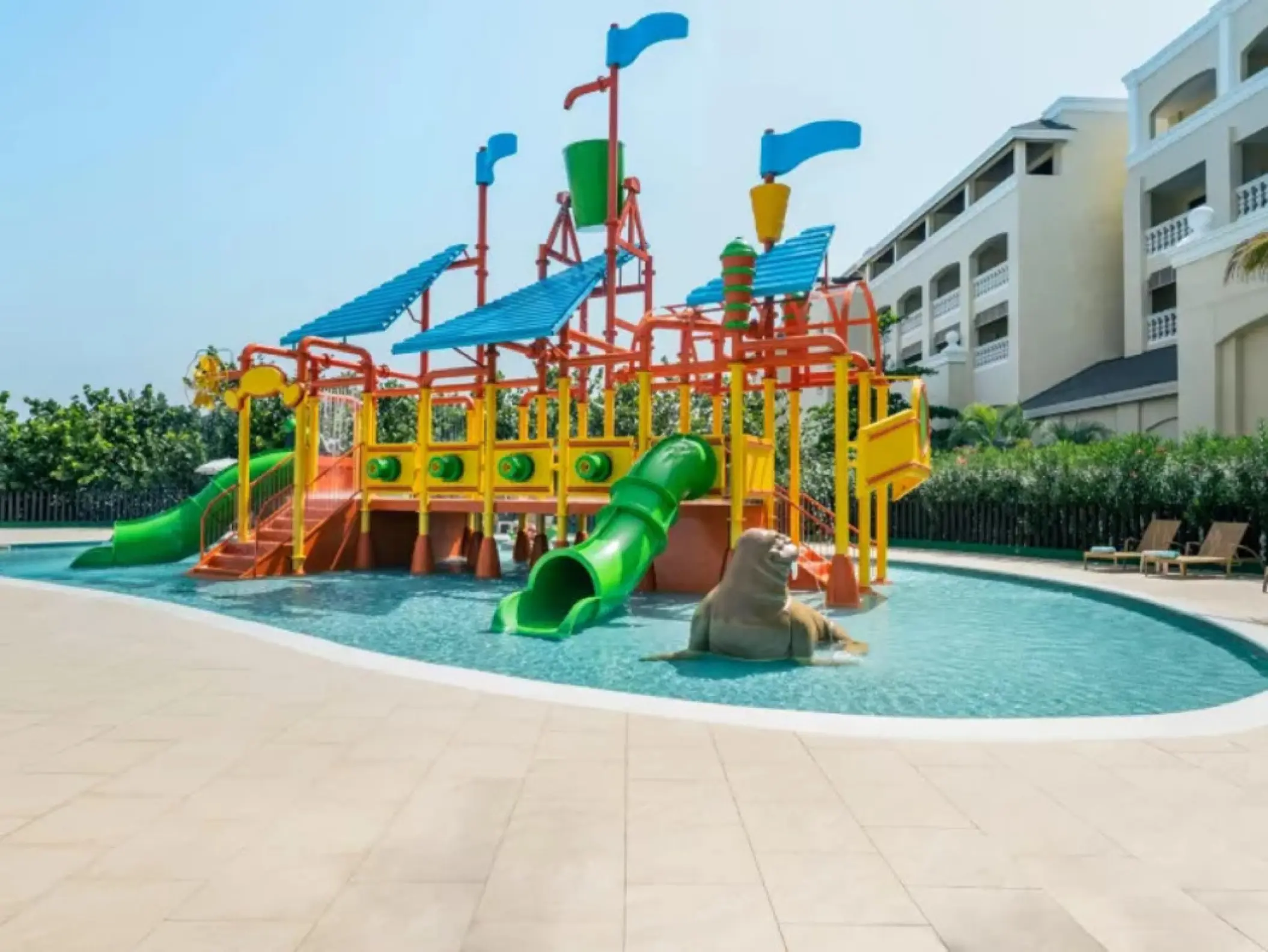 Colorful kids waterpark and splash pad at Iberostar Waves Rose Hall Beach, Montego Bay