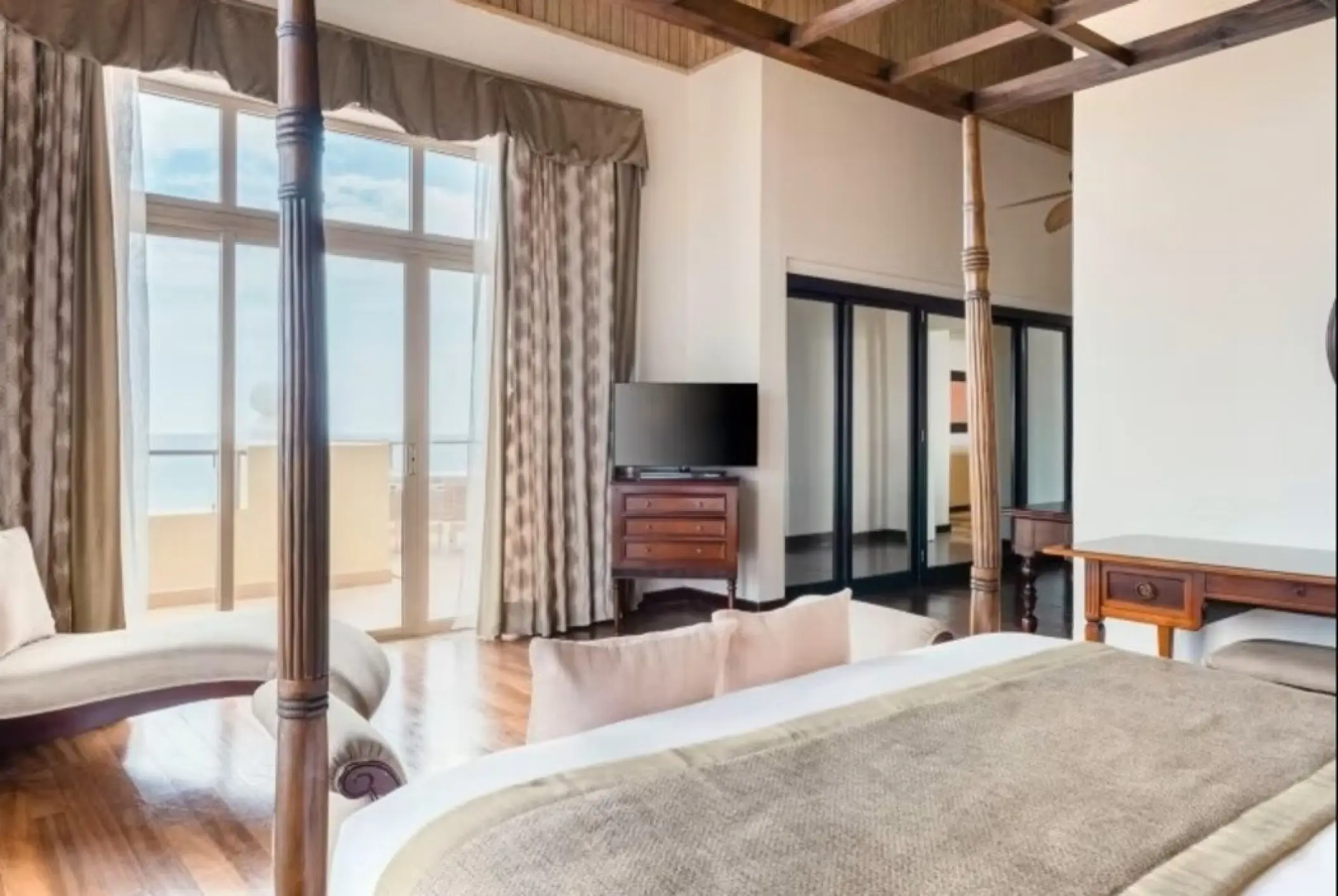 Iberostar Rose Hall Beach ocean view room with a four-poster bed and private balcony, Montego Bay