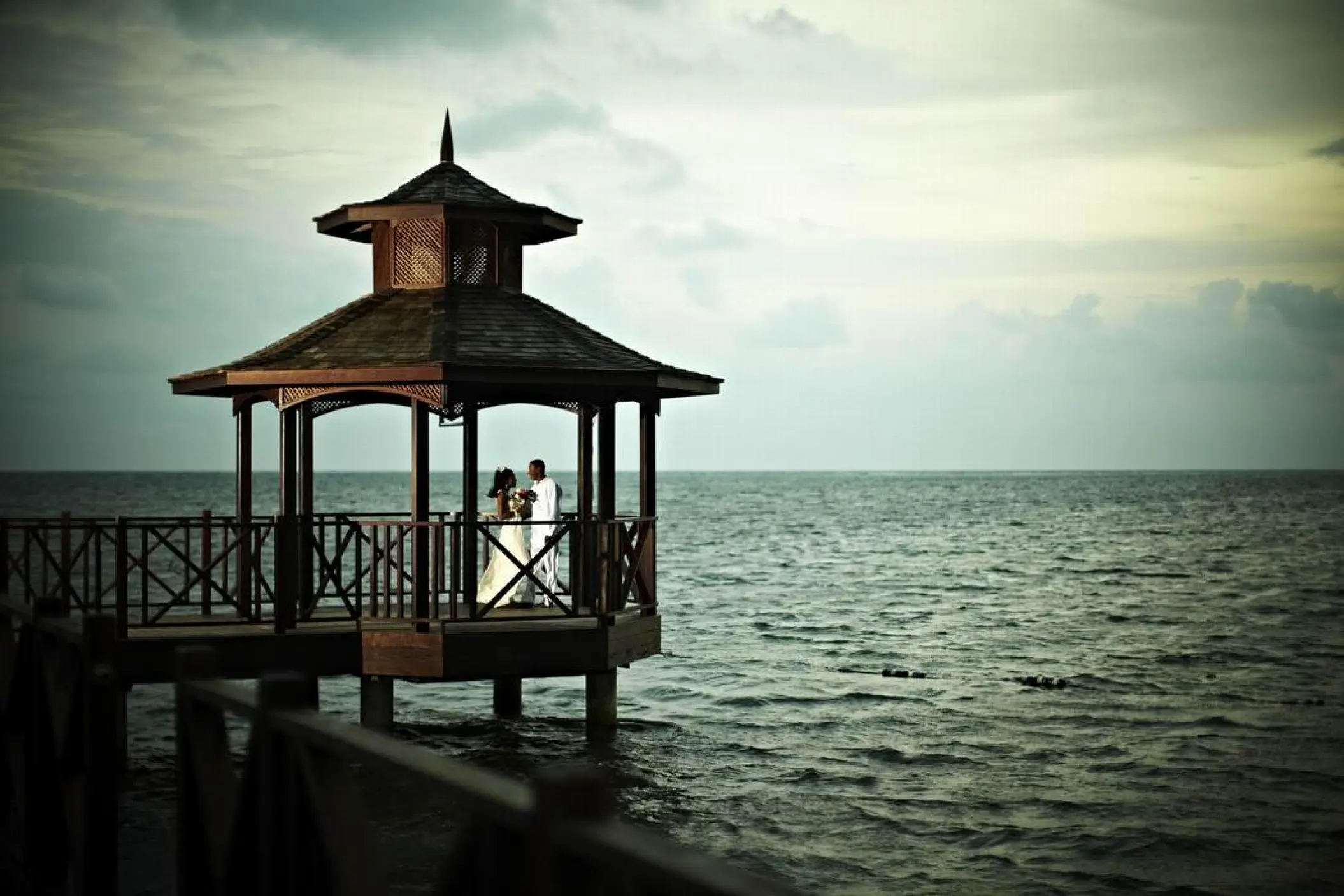 Pier gazebo wedding ceremony venue at Iberostar Waves Rose Hall Beach, Montego Bay