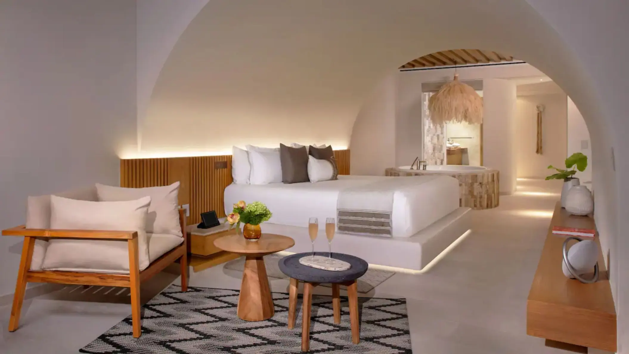 Presidential suite bedroom with a hot tub and arched ceiling at Impression Isla Mujeres by Secrets, Isla Mujeres