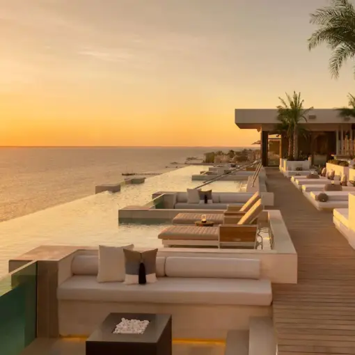 Rooftop infinity pool and lounge at sunset at Impression Isla Mujeres, Isla Mujeres