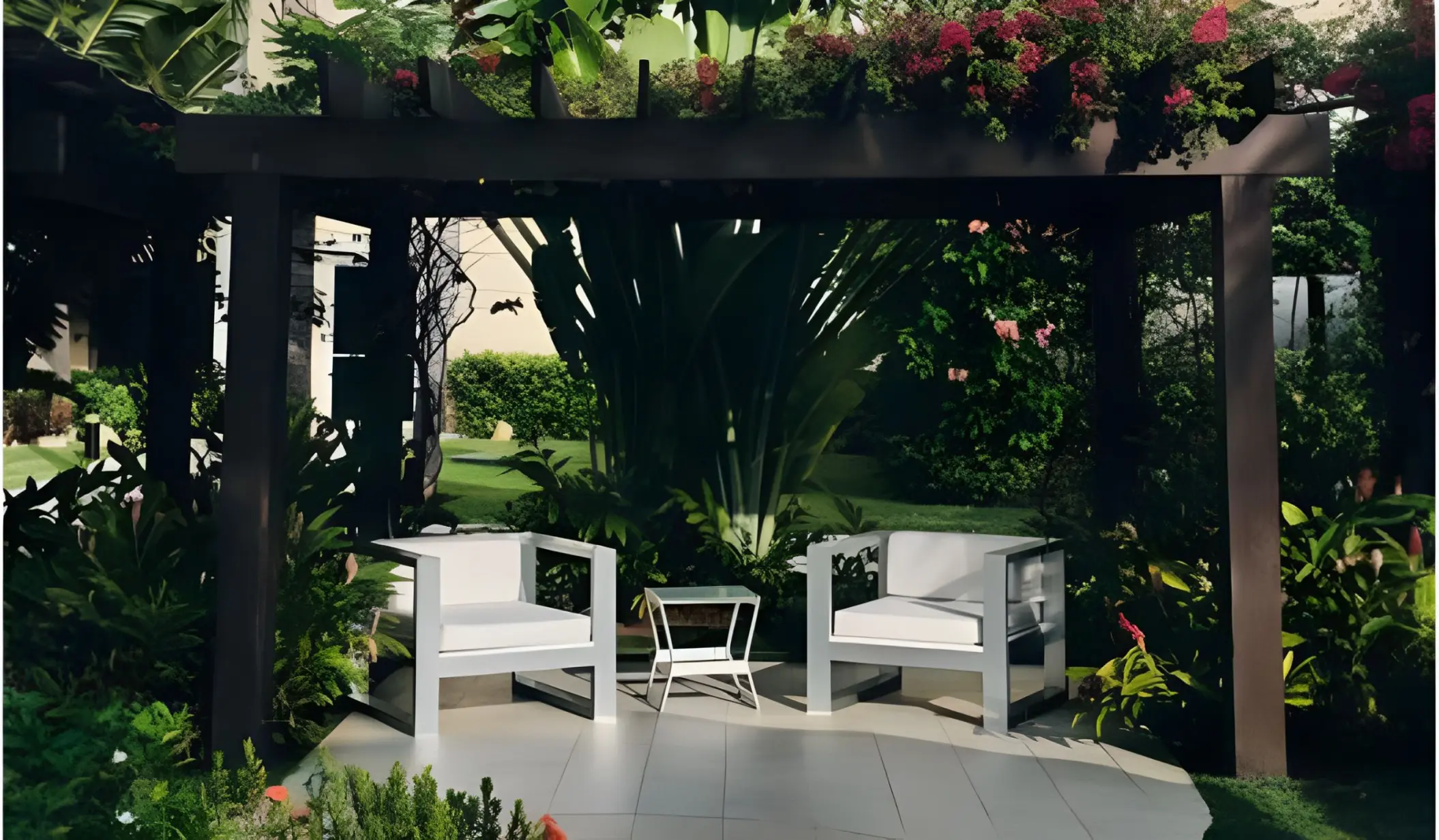 Garden pergola wedding venue with white armchairs at JOIA Rose Hall, Montego Bay