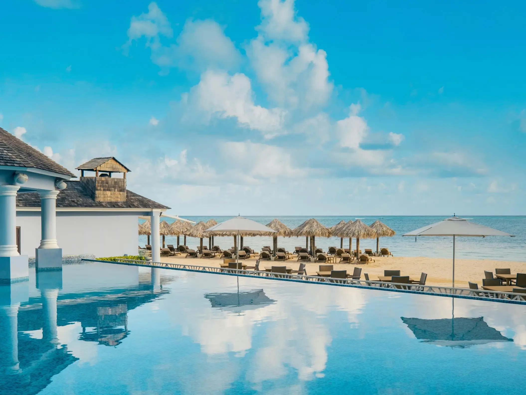 JOIA Rose Hall by Iberostar infinity pool overlooking the beach and Caribbean Sea, Montego Bay