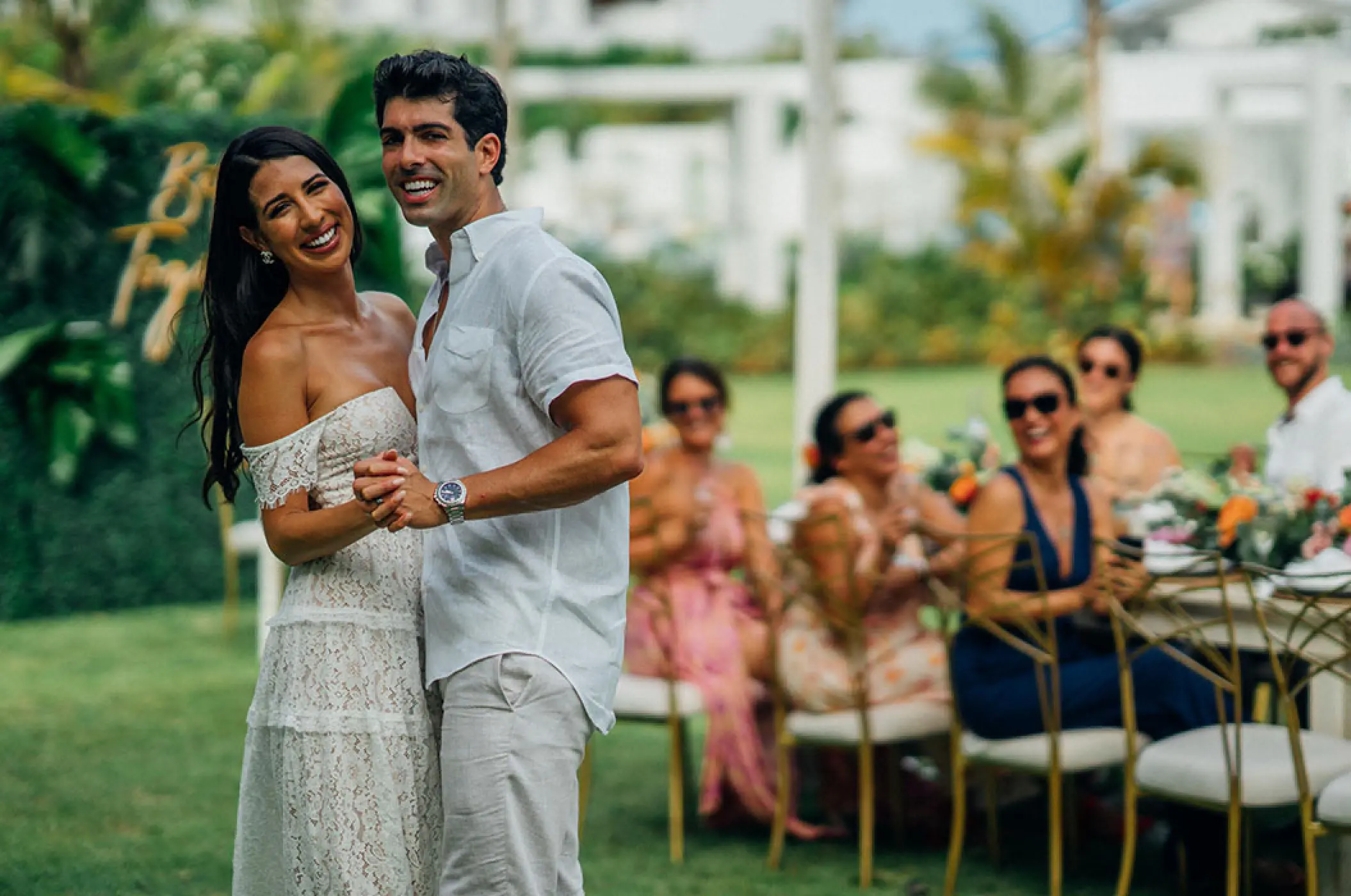 Newlywed couple dancing at an outdoor reception at Margaritaville Island Reserve Cap Cana, Punta Cana