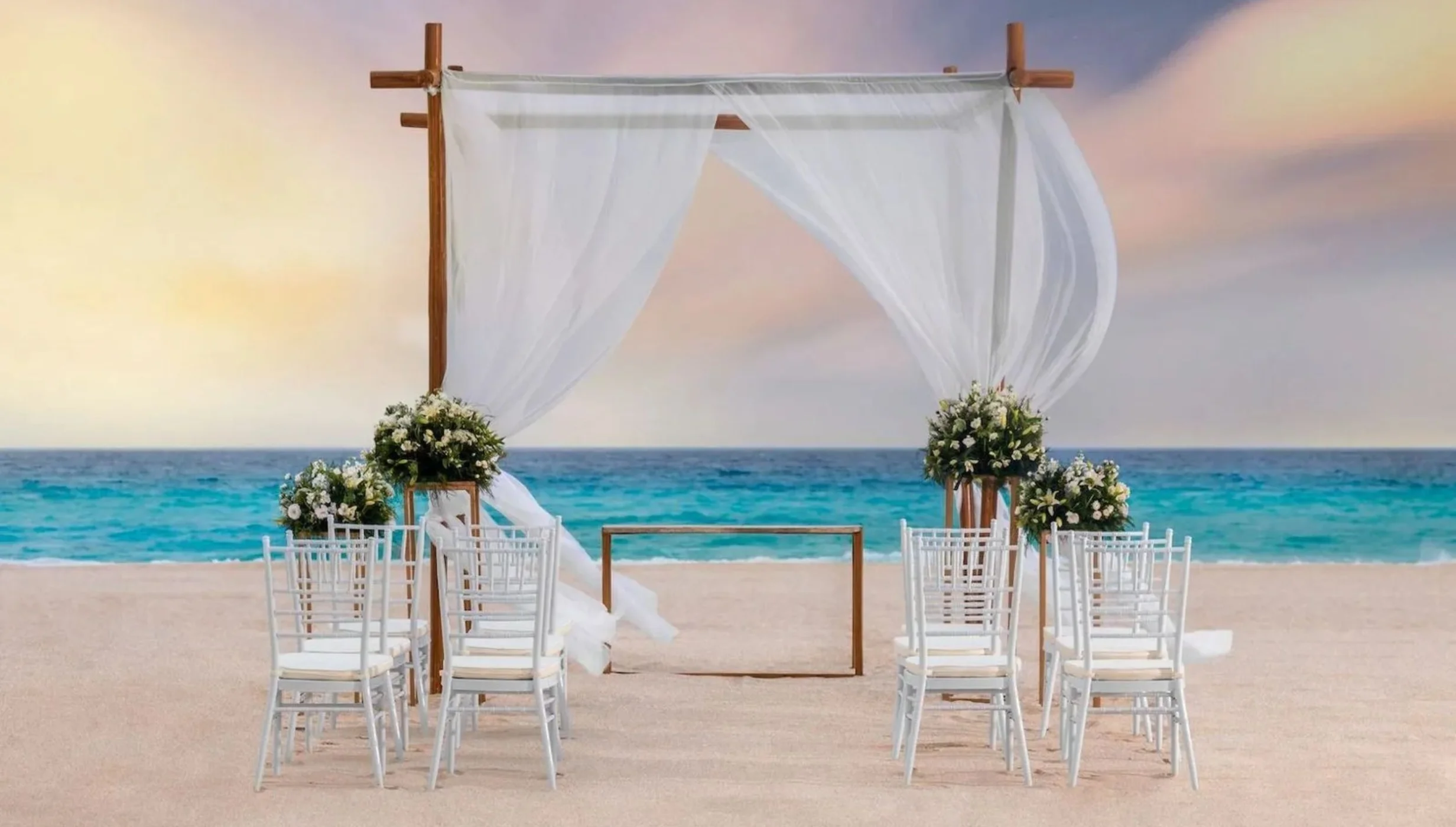 beach wedding setup at Le Blanc Spa Resort Cancun