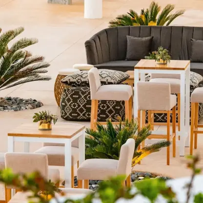 Outdoor lounge and cocktail seating on the Blanc Sol Terrace at Le Blanc Cancun