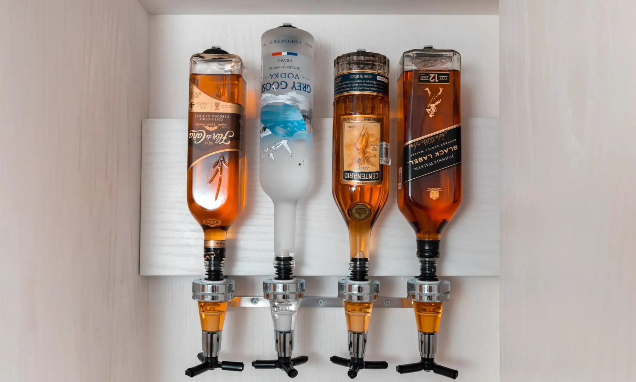 In-room premium liquor dispenser at Le Blanc Spa Resort, Cancun