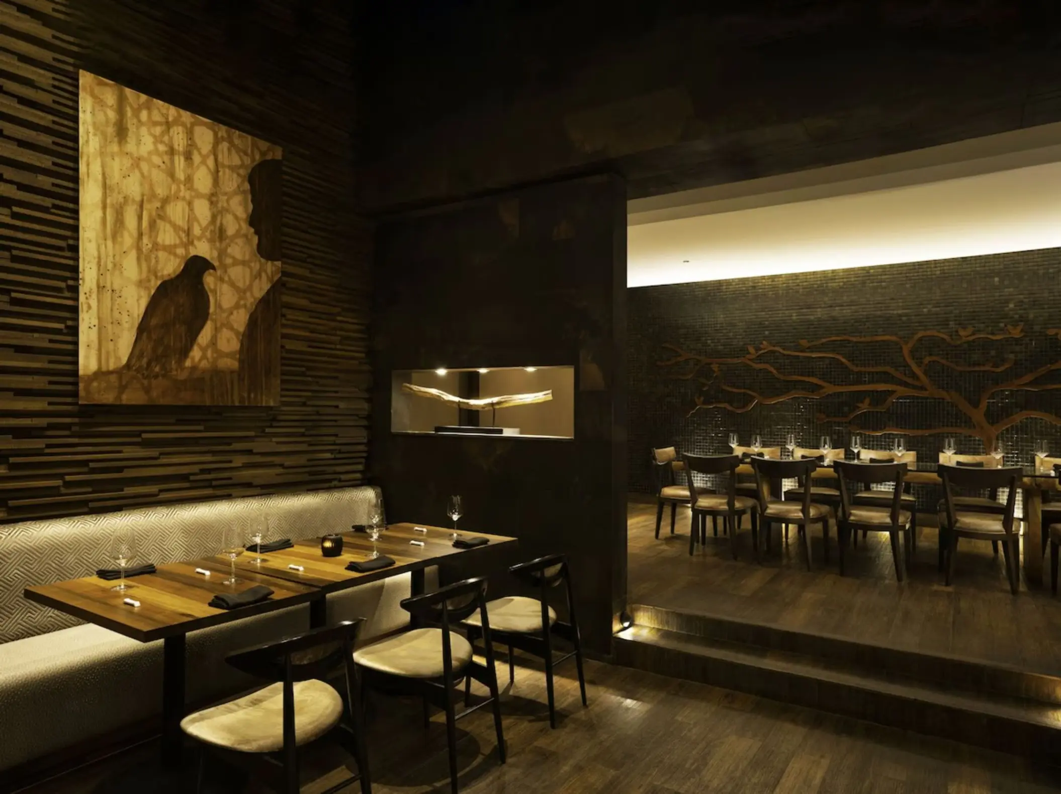 Modern fine dining restaurant with dark wood accents at Le Blanc Spa Resort, Cancun