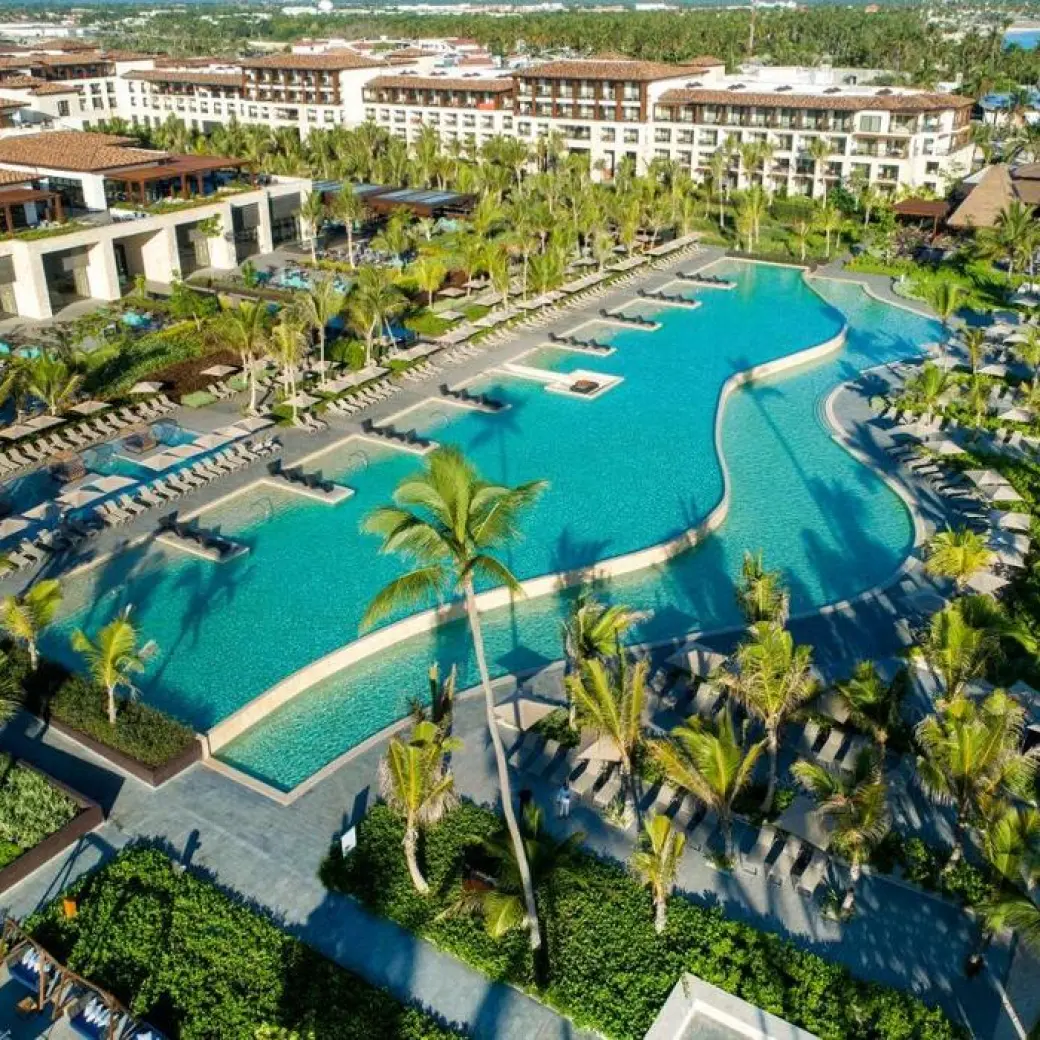 Aerial view of large winding pools and resort grounds at Lopesan Costa Bavaro, Punta Cana