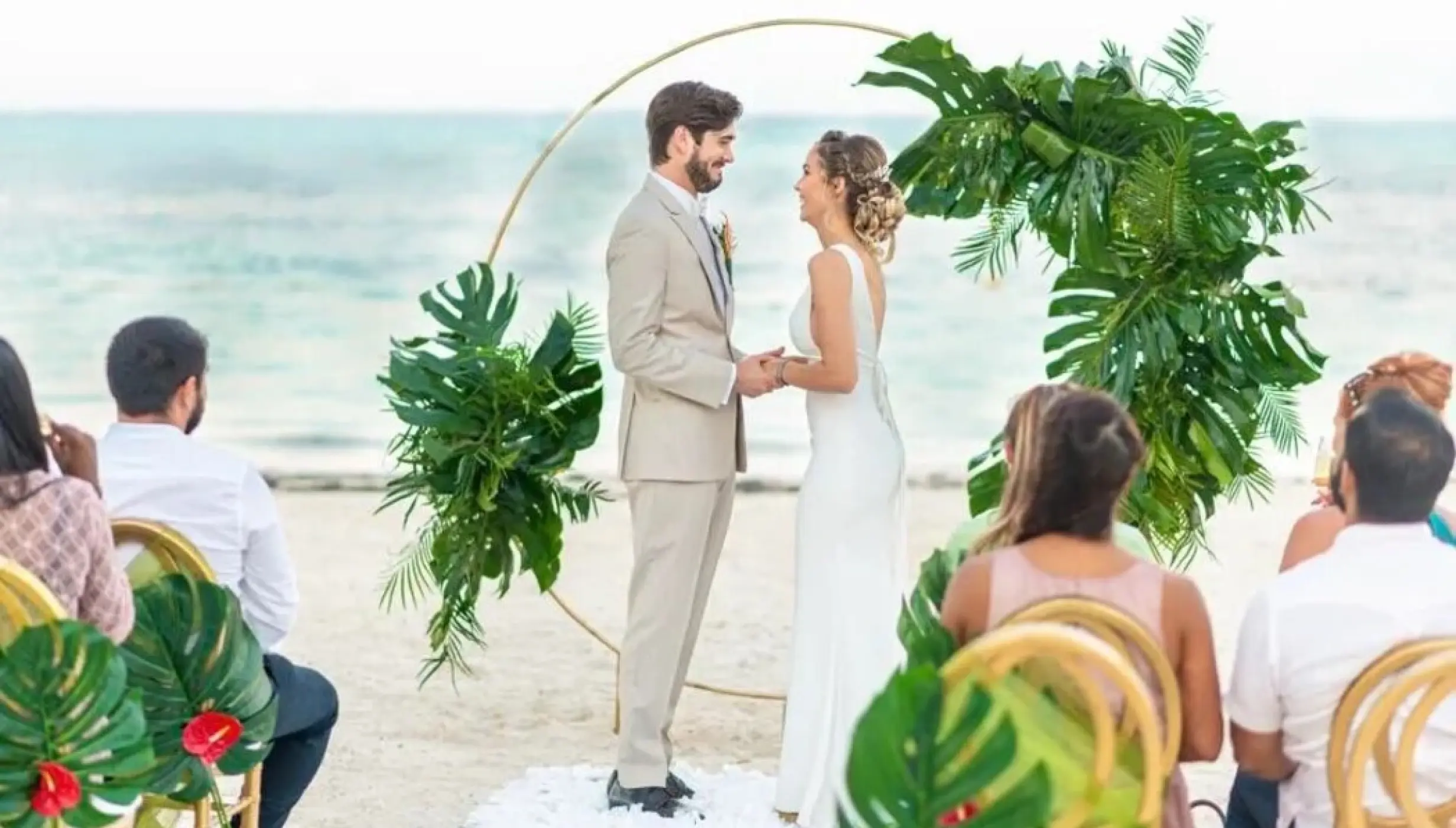 bride groom and guests at the beach venue at Lopesan Costa Bavaro Resort