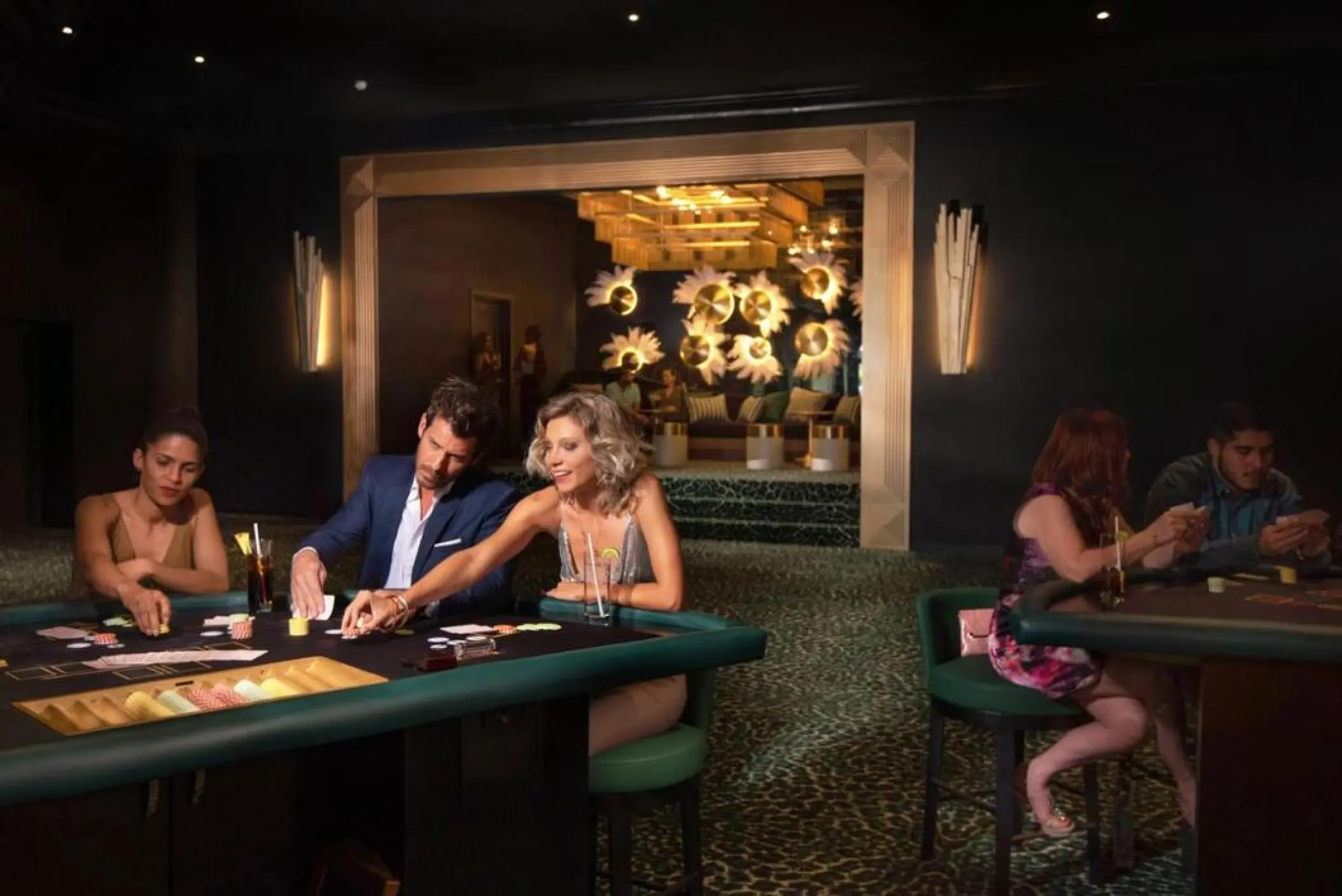 Guests playing blackjack in the casino at Lopesan Costa Bavaro, Punta Cana