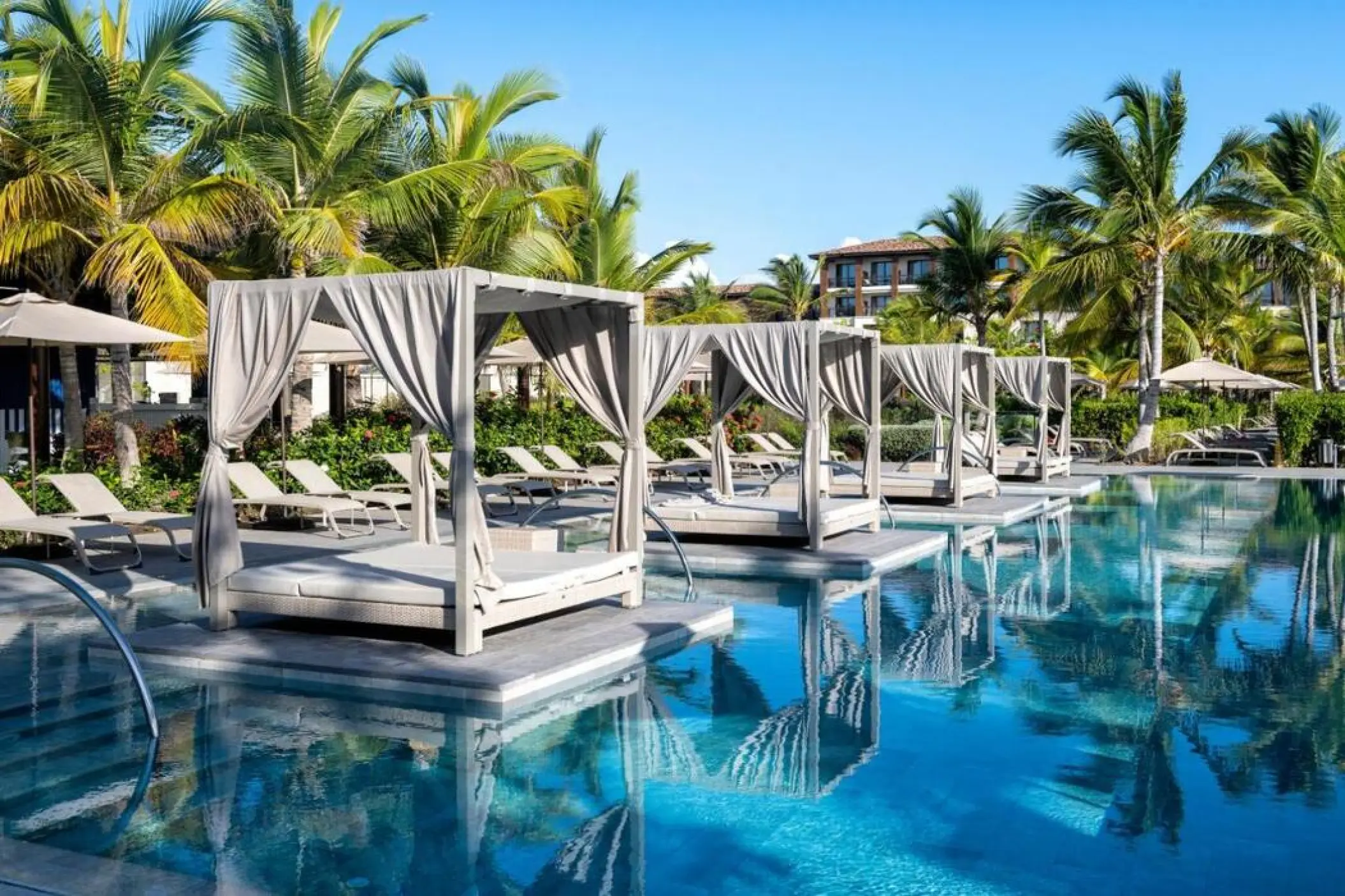 Poolside cabanas and loungers at Lopesan Costa Bavaro, Punta Cana