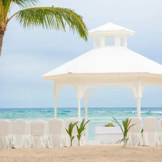 White beach gazebo wedding ceremony at Majestic Colonial, Punta Cana