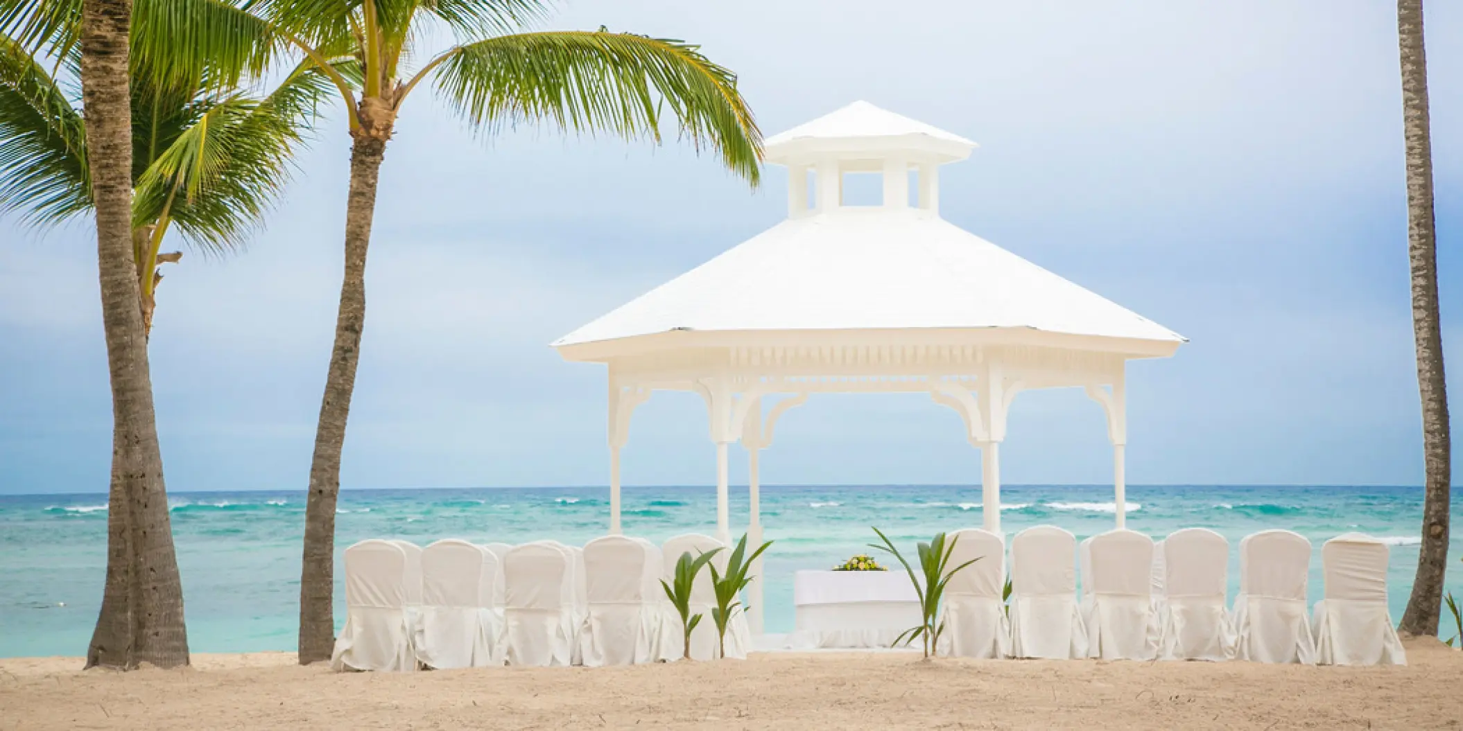 White beach gazebo wedding ceremony at Majestic Colonial, Punta Cana