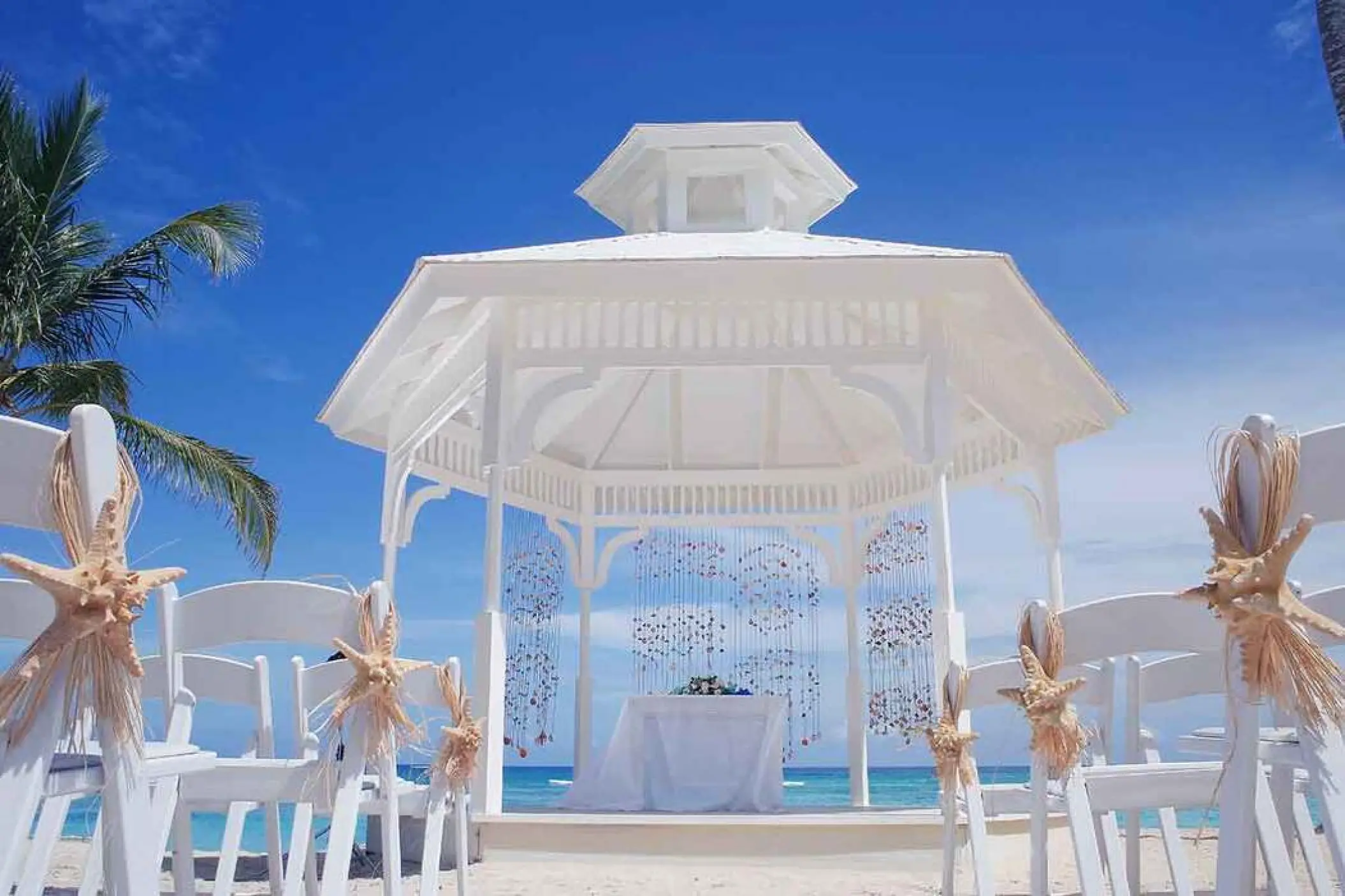 White beach gazebo wedding ceremony at Majestic Colonial, Punta Cana