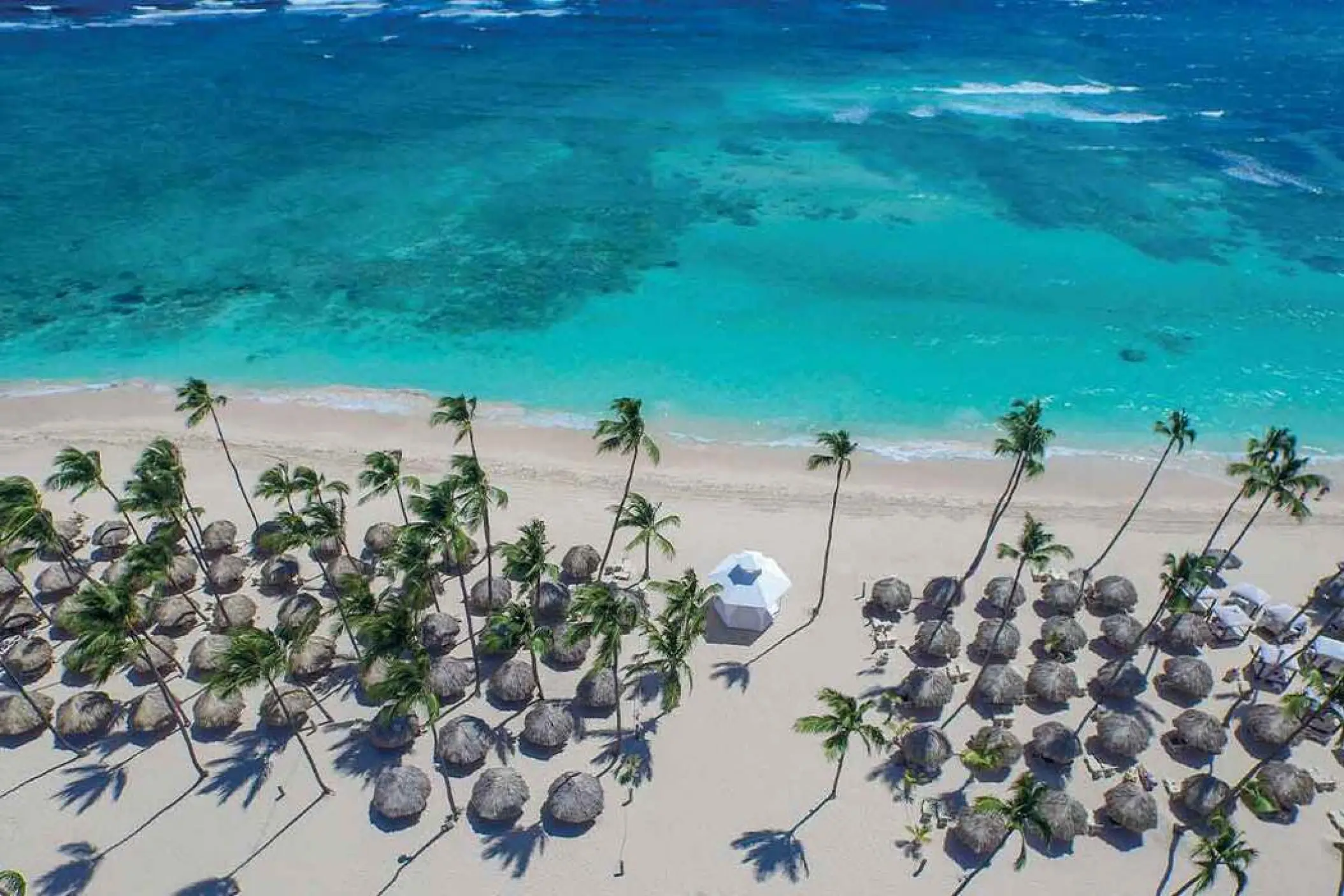 Aerial view of the beach gazebo and turquoise water at Majestic Colonial, Punta Cana