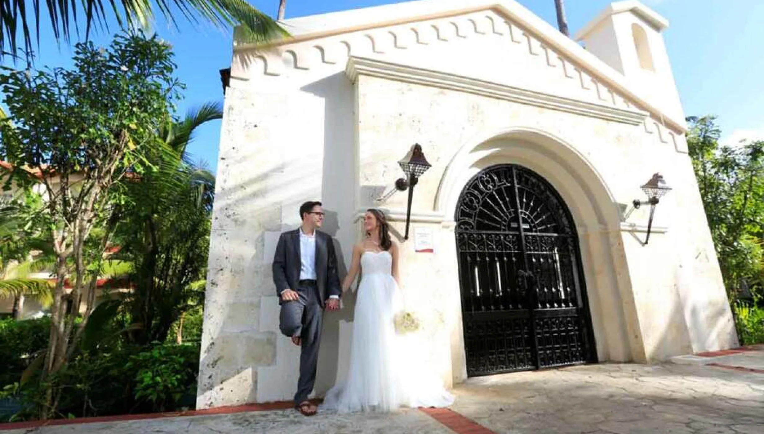 bride and groom at the chapel at Majestic Colonial Punta Cana