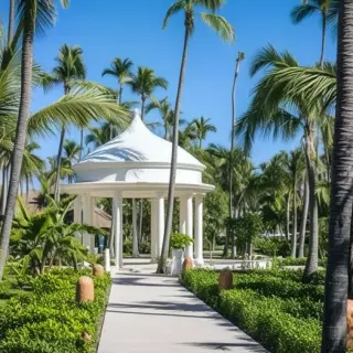 Garden wedding gazebo surrounded by palm trees at Majestic Colonial, Punta Cana