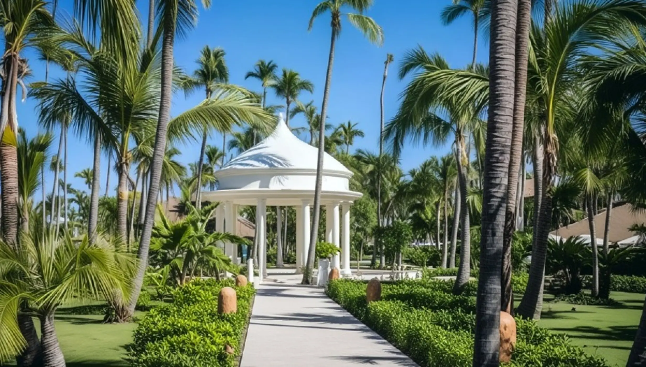 Garden wedding gazebo surrounded by palm trees at Majestic Colonial, Punta Cana