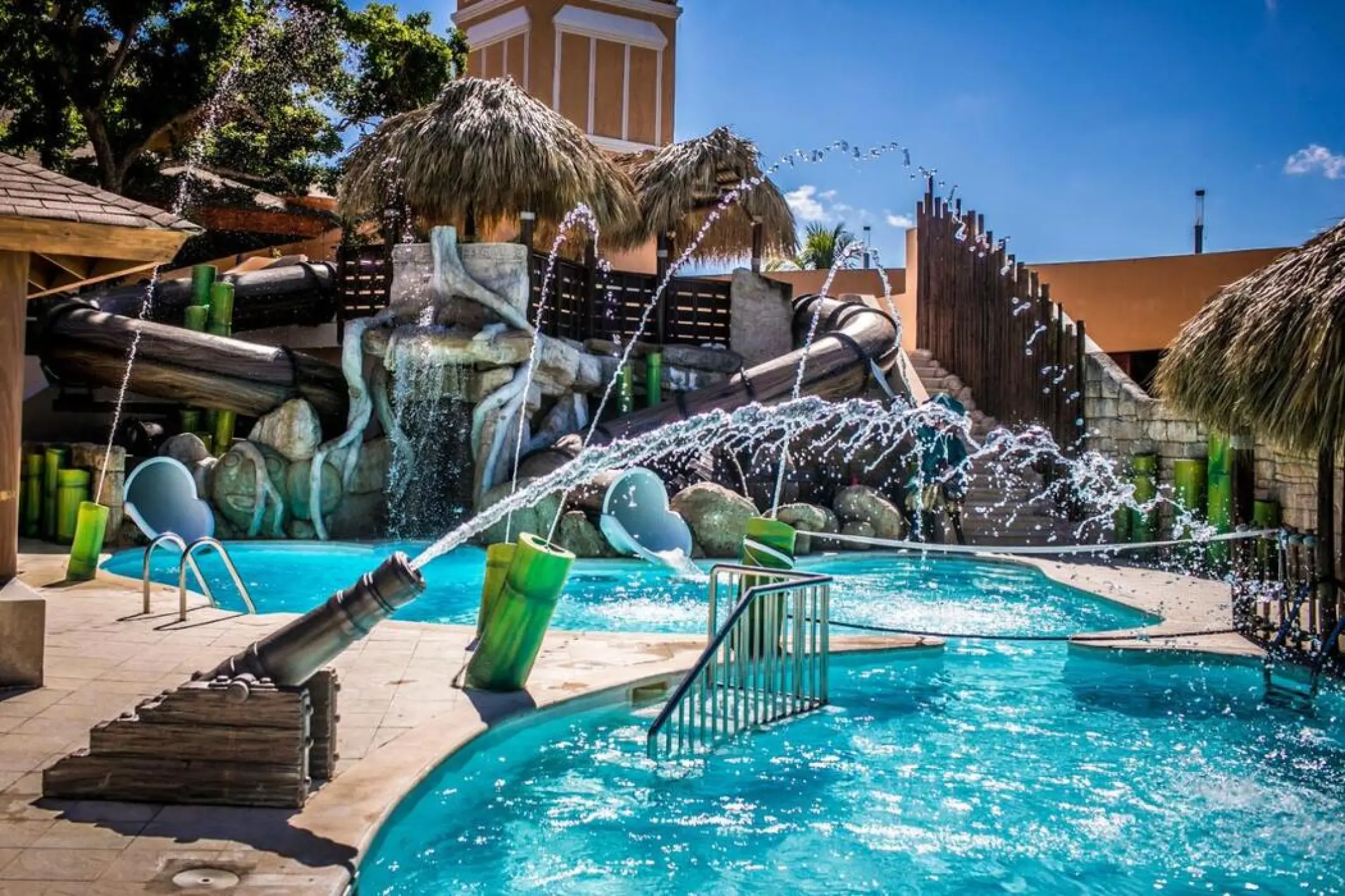 Kids water park with slides and fountains at Majestic Colonial Punta Cana