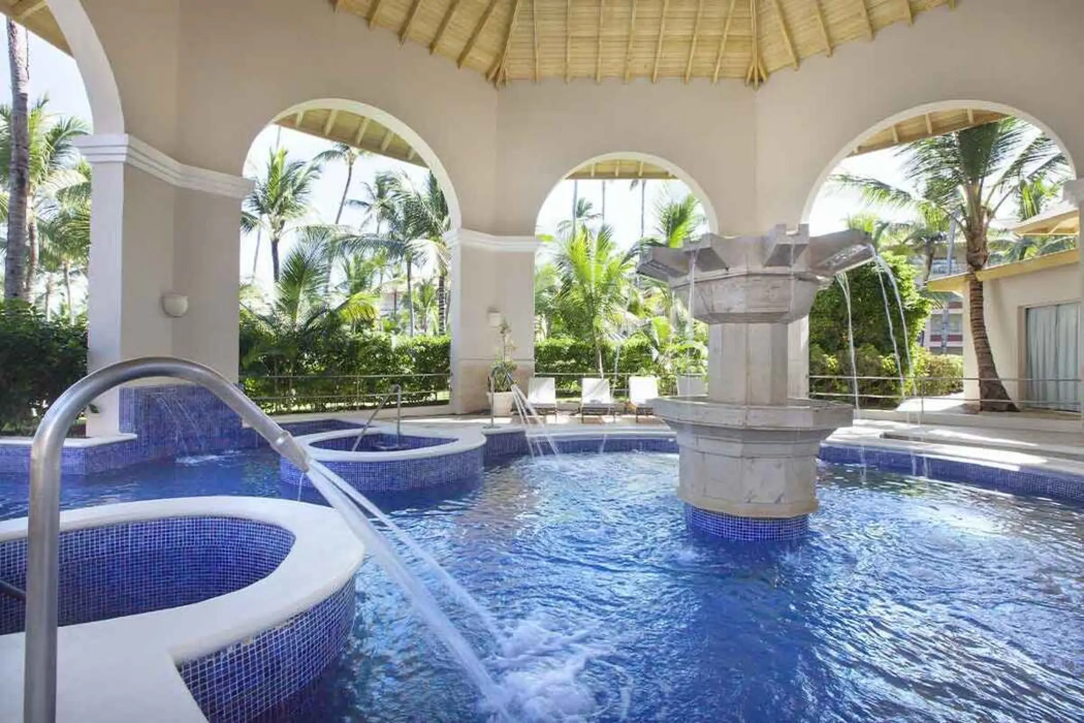 Hydrotherapy circuit with central stone fountain at Majestic Colonial, Punta Cana