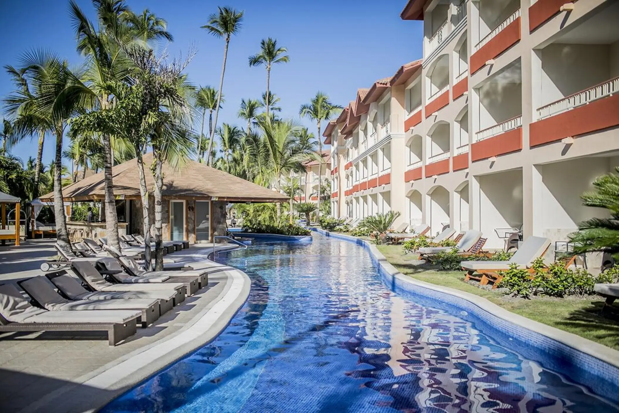 Swim-out suites exterior and pool at Majestic Colonial Punta Cana, Punta Cana