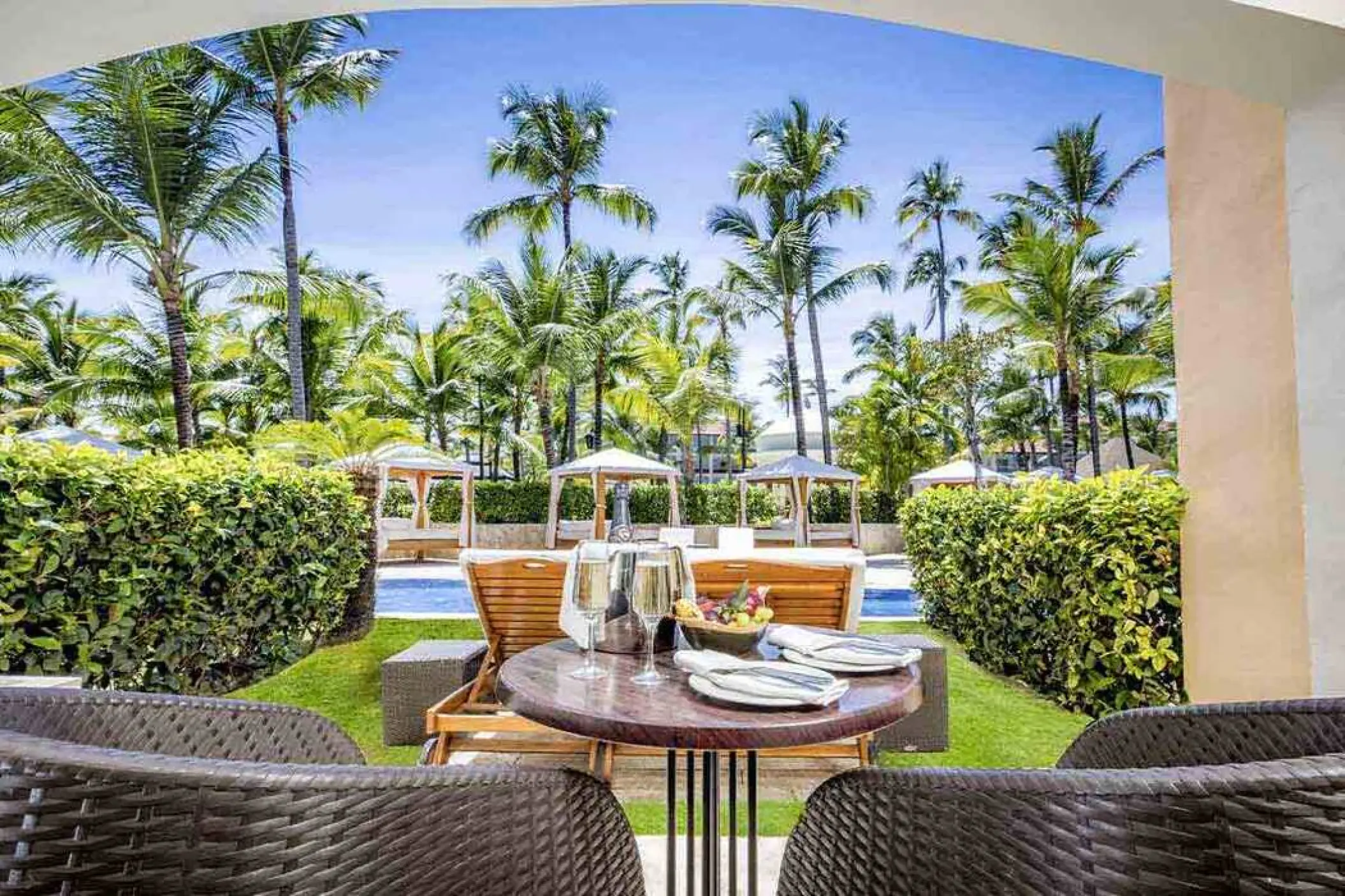 Private suite terrace with champagne and garden view at Majestic Colonial, Punta Cana