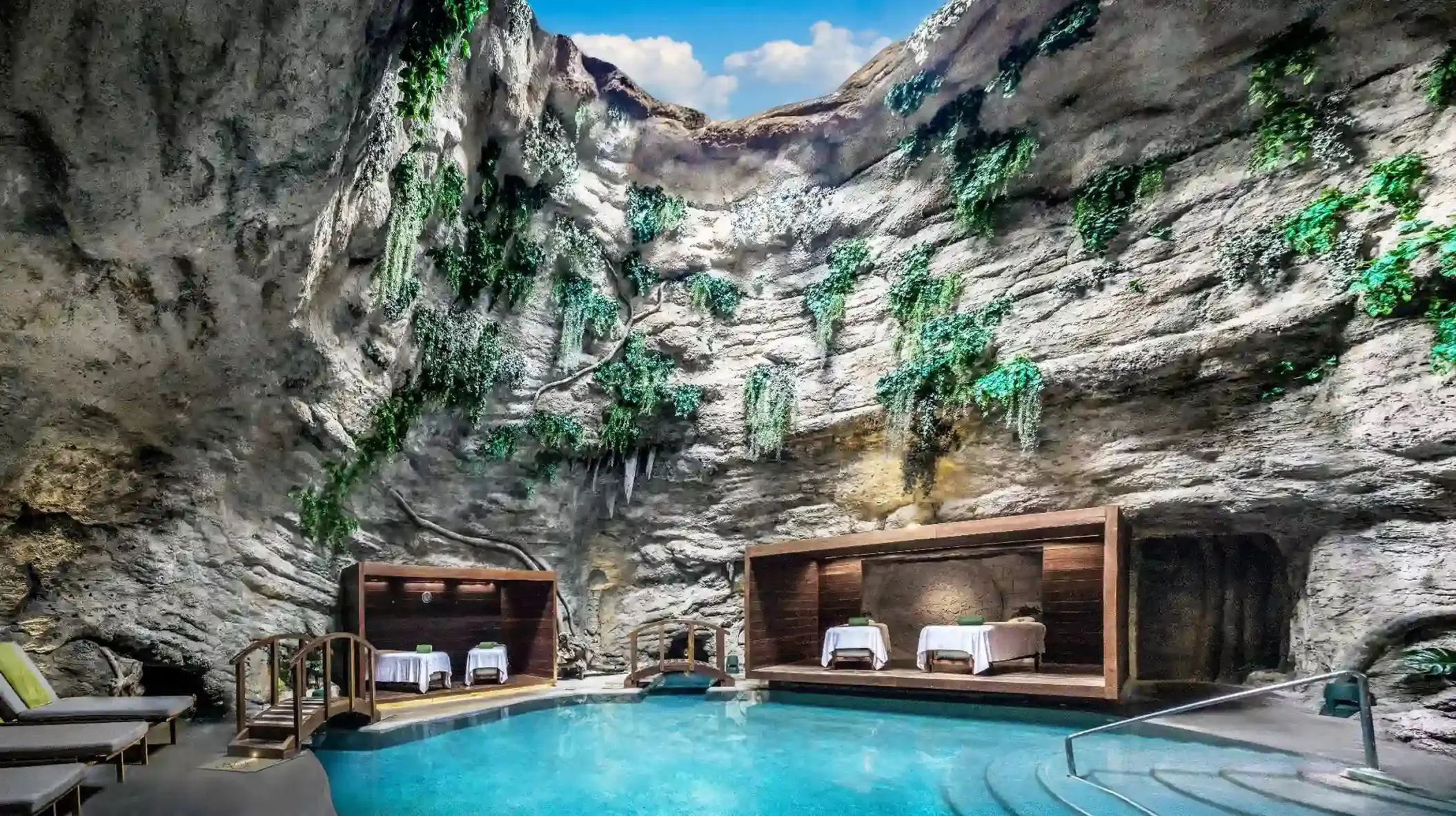 Cenote-style spa pool with massage tables at Majestic Mirage Costa Mujeres, Cancun