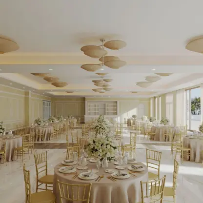 Sunrise Ballroom wedding reception with gold chairs at Majestic Mirage Costa Mujeres, Cancun