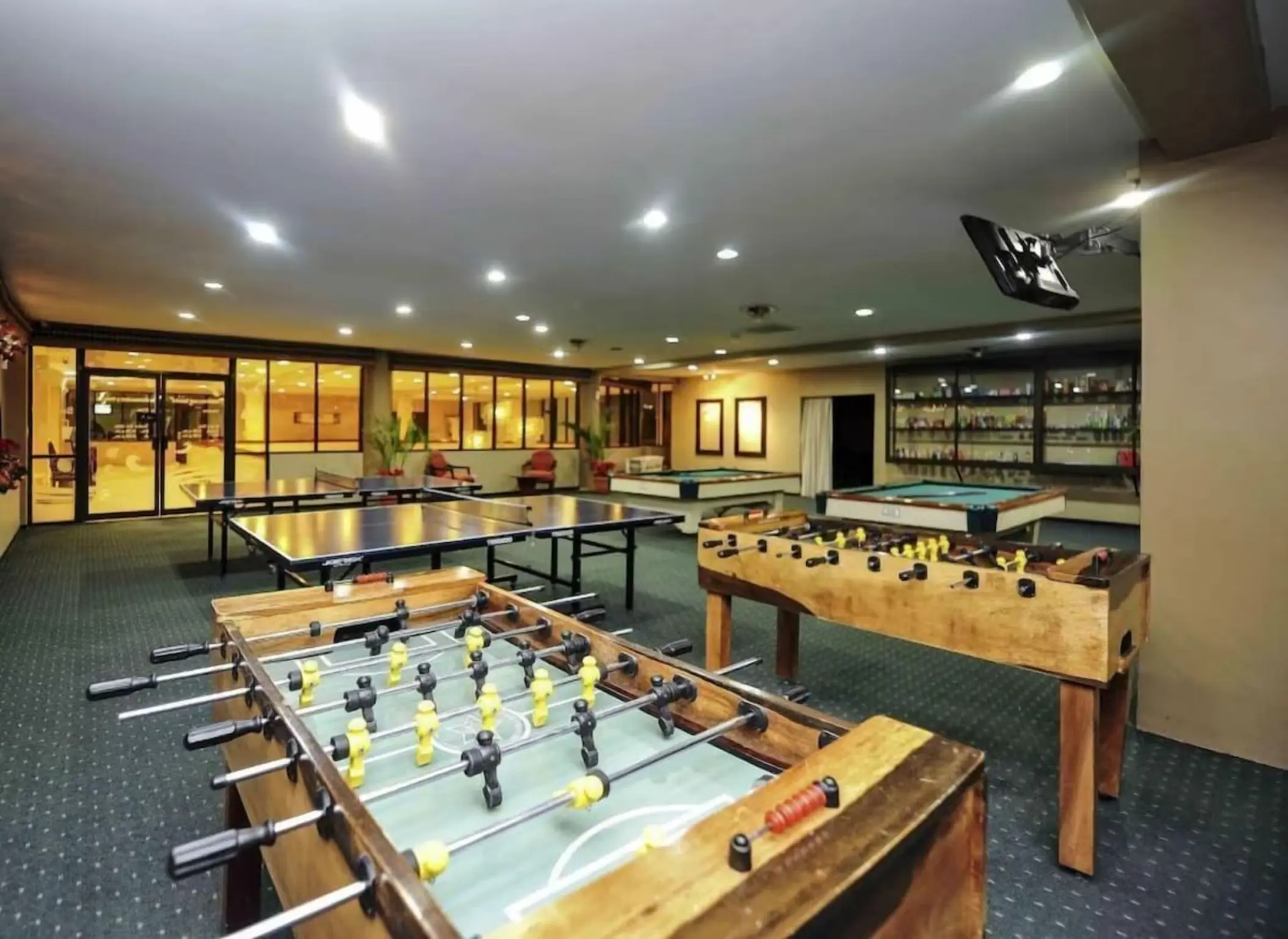 Foosball and ping pong tables in the games room at Margaritaville Playa Flamingo, Liberia