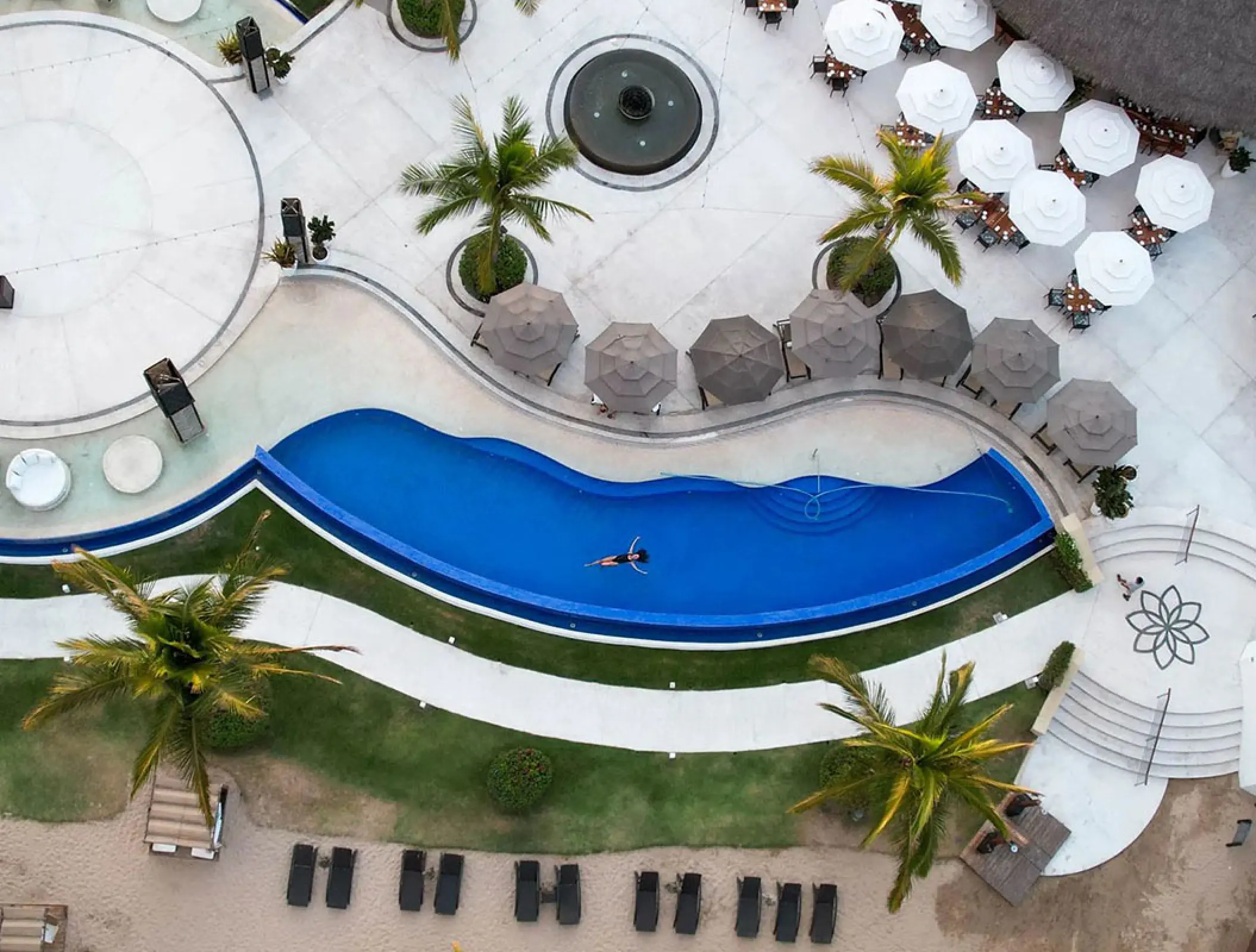 Aerial view of a swimmer in the Marival Distinct pool, Puerto Vallarta