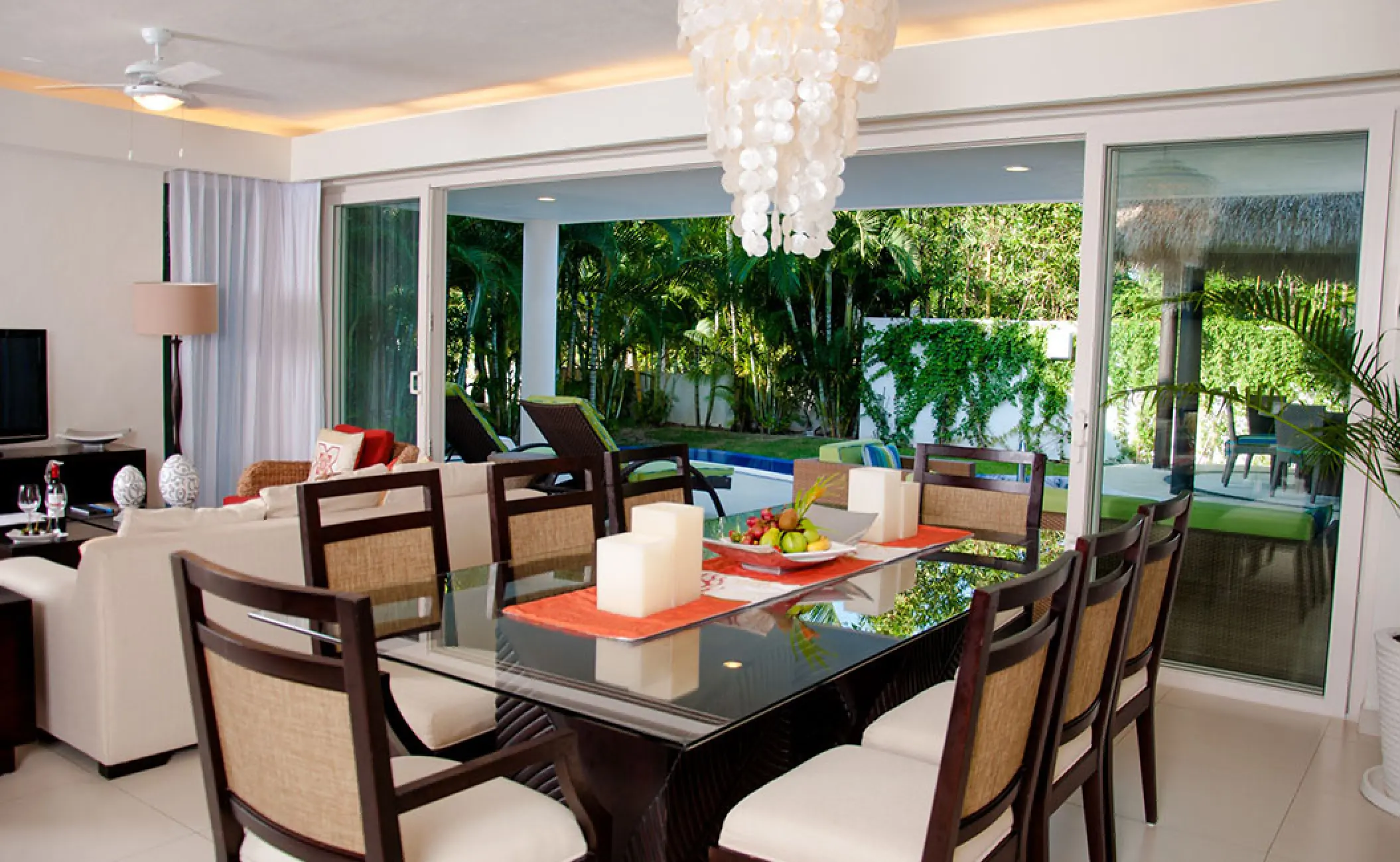 Villa living area and dining table at Marival Distinct, Puerto Vallarta