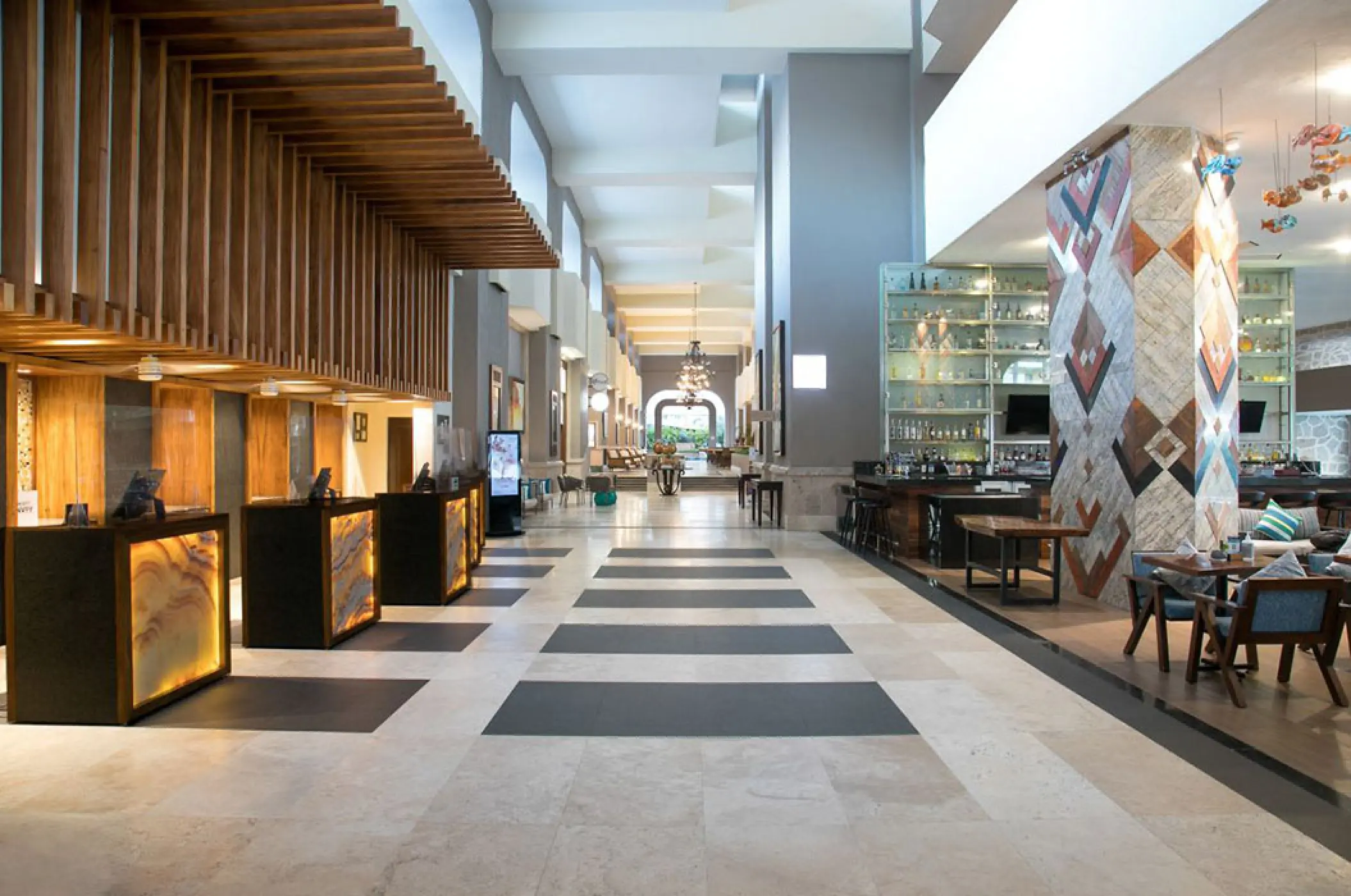 Lobby and front desk with modern wood paneling at Marriott Puerto Vallarta, Puerto Vallarta
