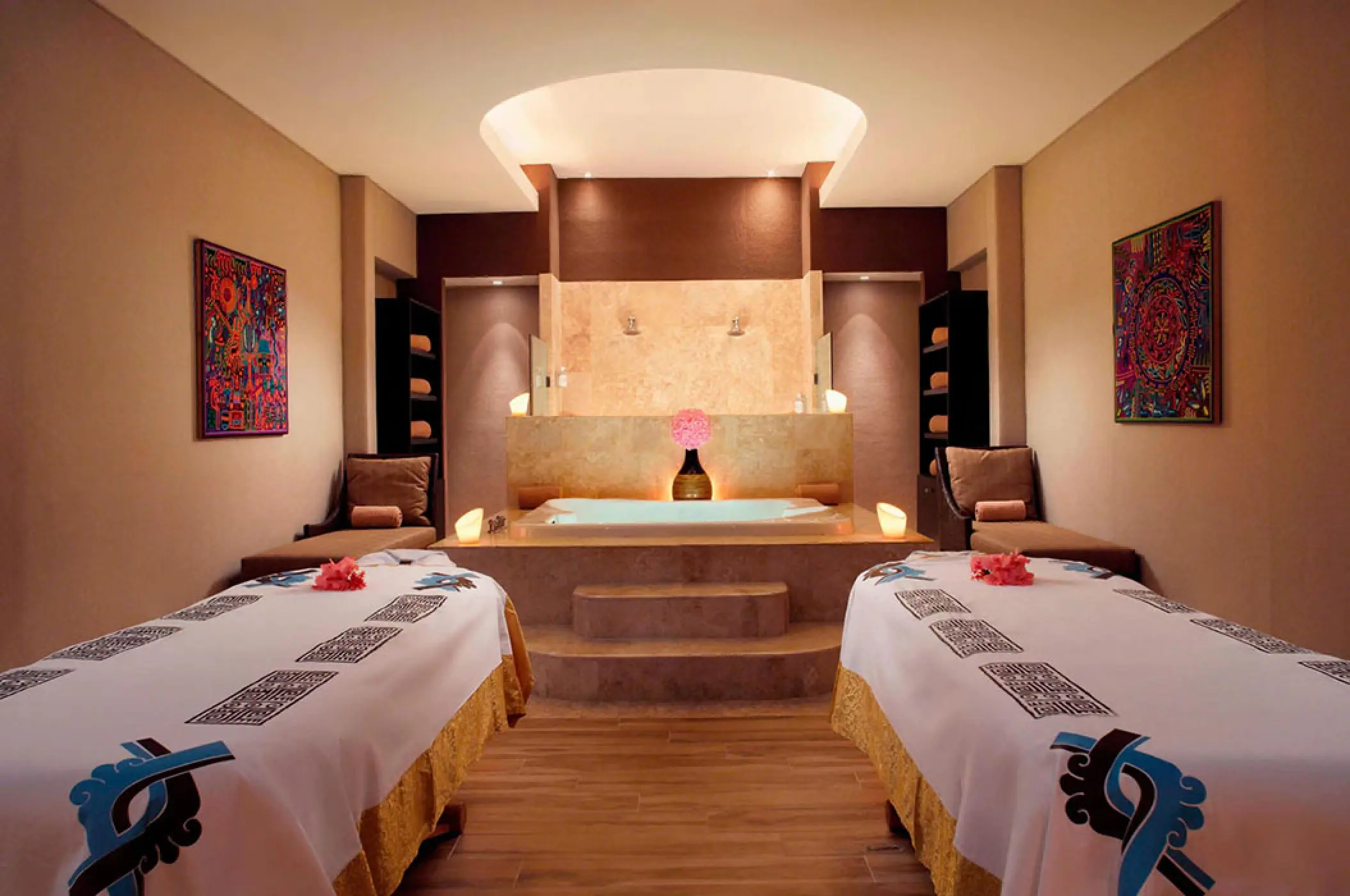 Couples massage suite with two treatment beds and a hot tub at Marriott Puerto Vallarta, Puerto Vallarta