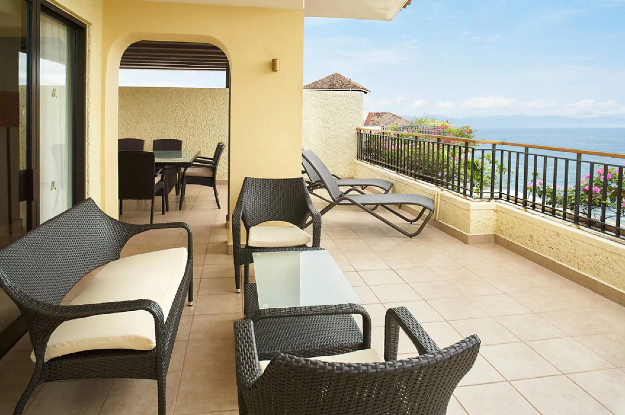 Marriott Puerto Vallarta suite terrace with lounge chairs and ocean views, Puerto Vallarta