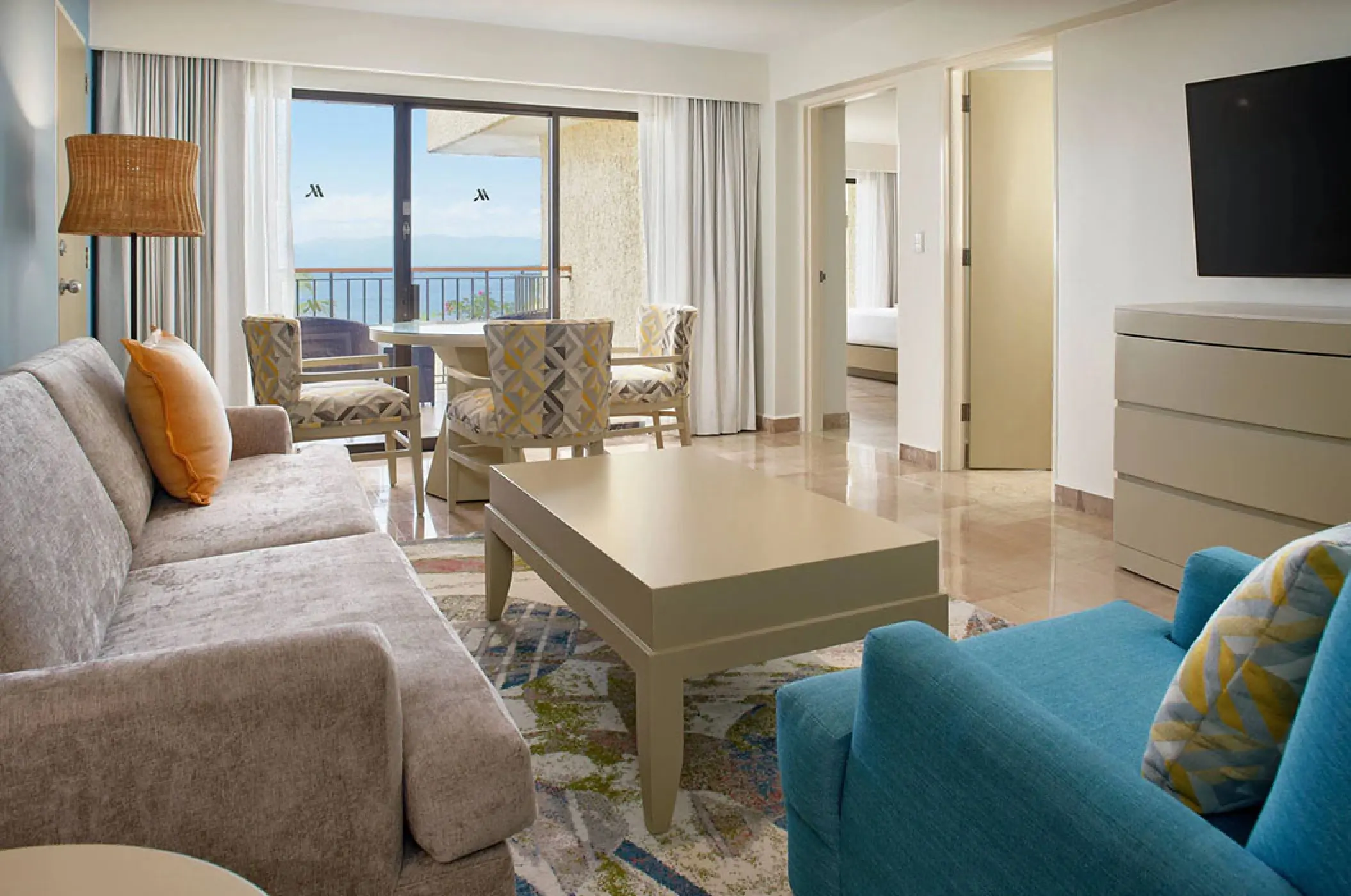 Junior Suite living area with balcony access at Marriott Puerto Vallarta, Puerto Vallarta