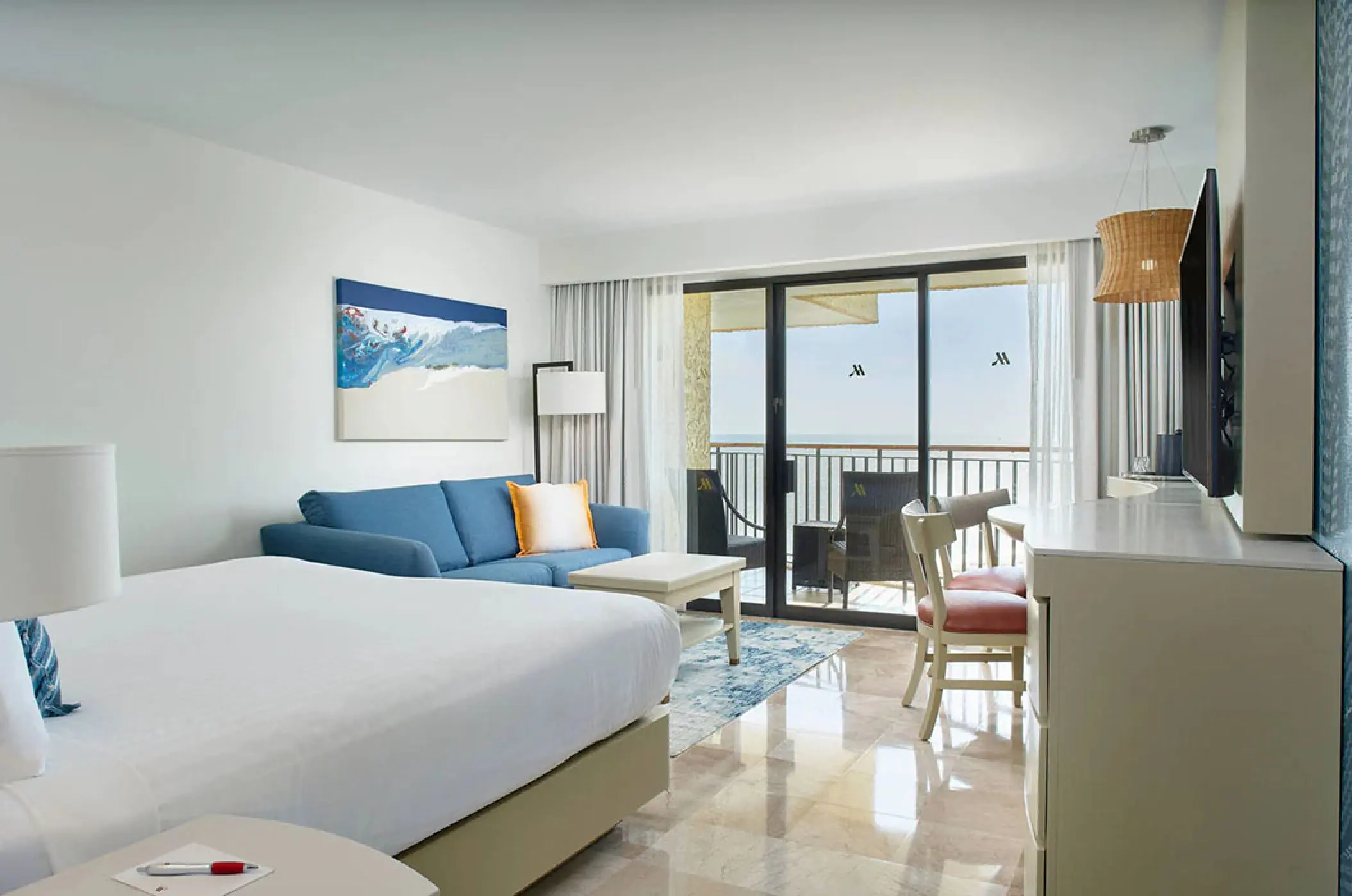 Marriott Puerto Vallarta king ocean view room with blue sofa and balcony, Puerto Vallarta