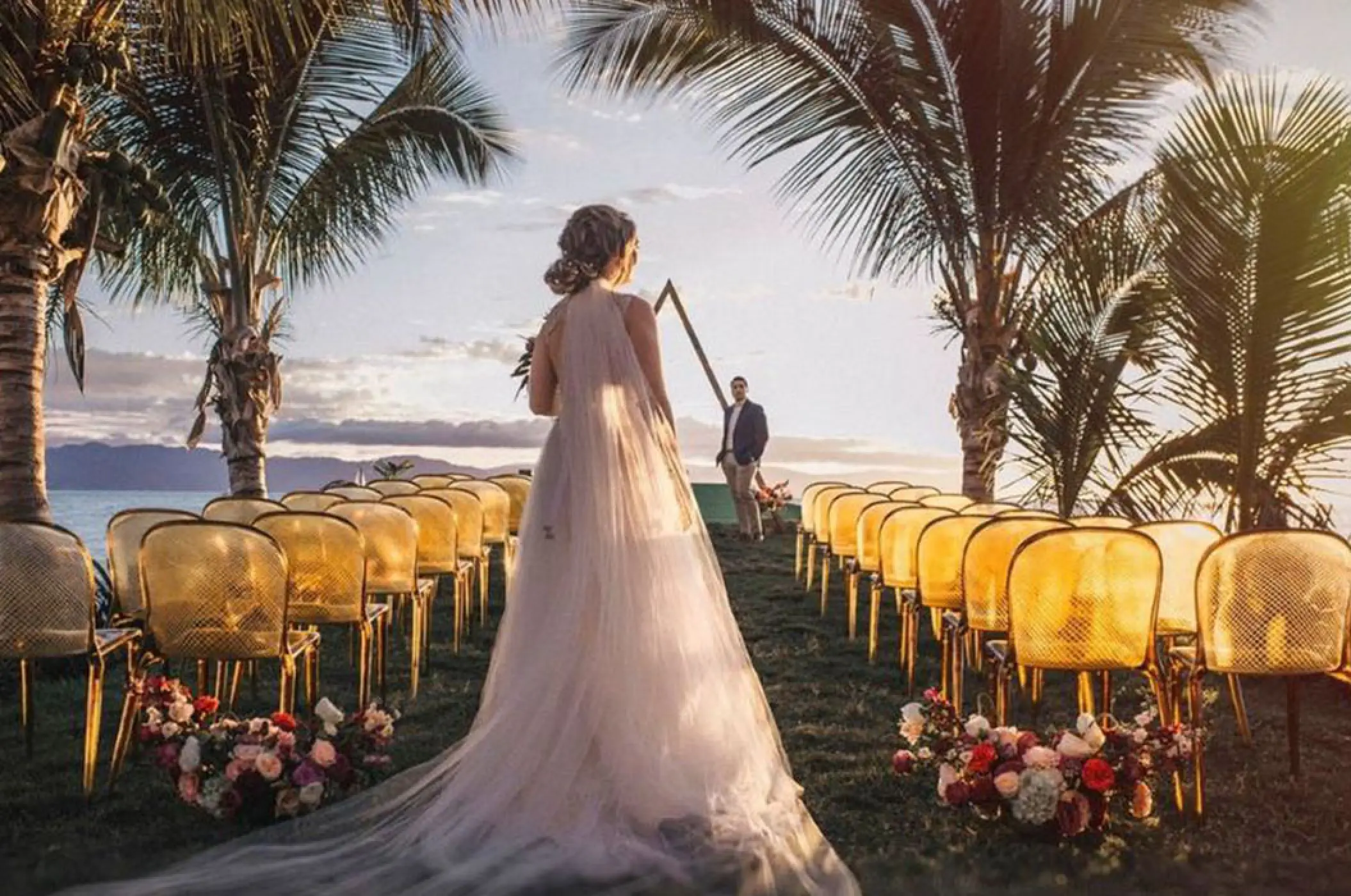 Bride walking down the aisle for a wedding ceremony at Marriott Puerto Vallarta, Puerto Vallarta