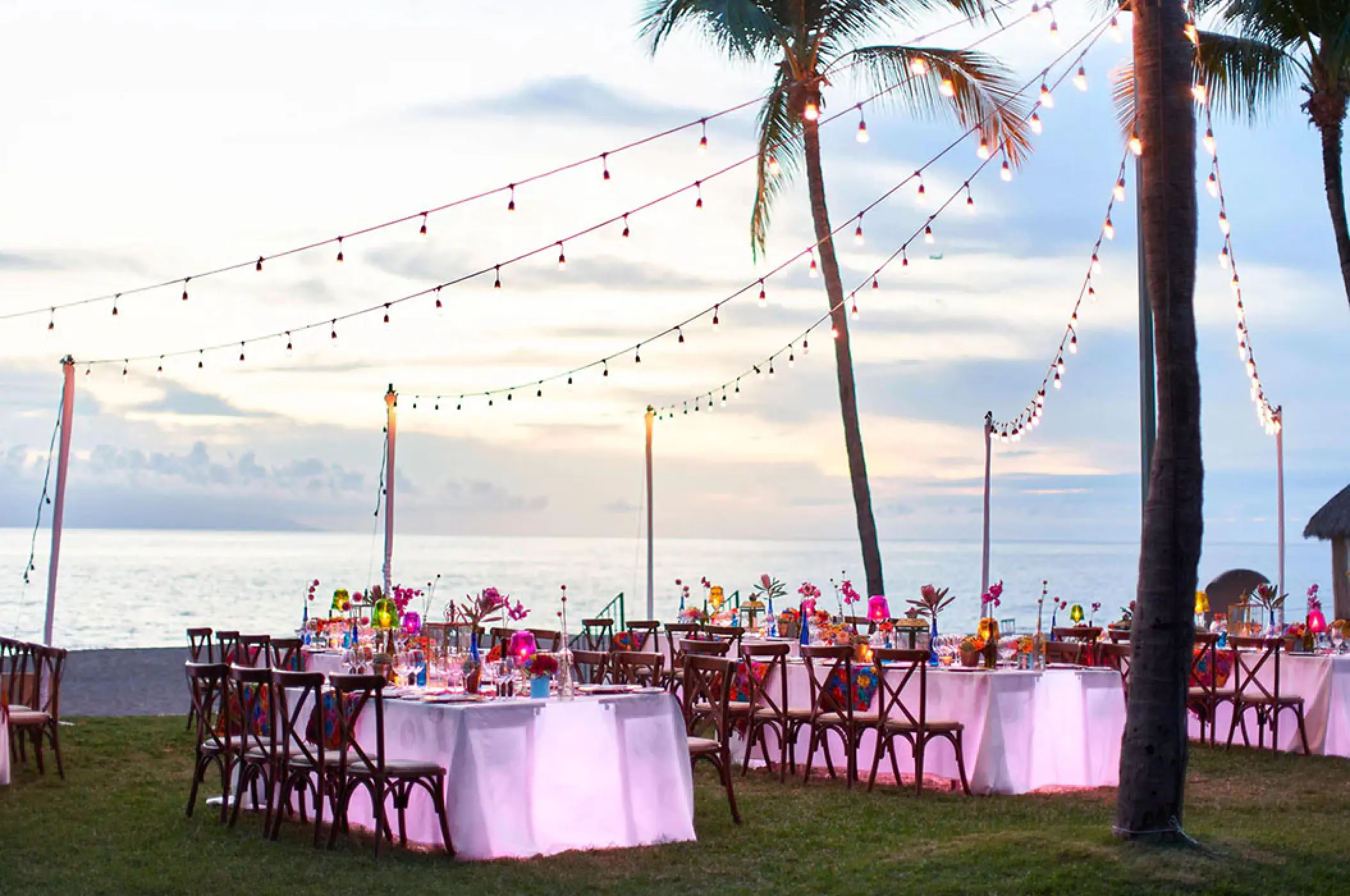 Outdoor wedding reception with string lights at Marriott Puerto Vallarta, Puerto Vallarta