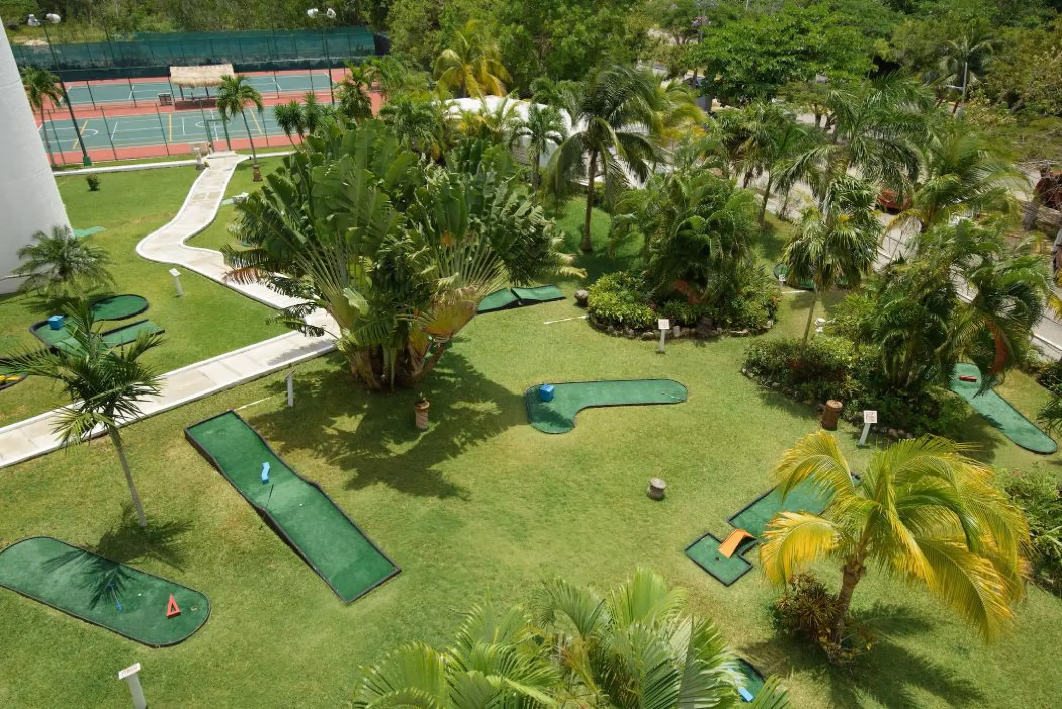Aerial view of the mini-golf course and tennis courts at Melia Cozumel, Cozumel