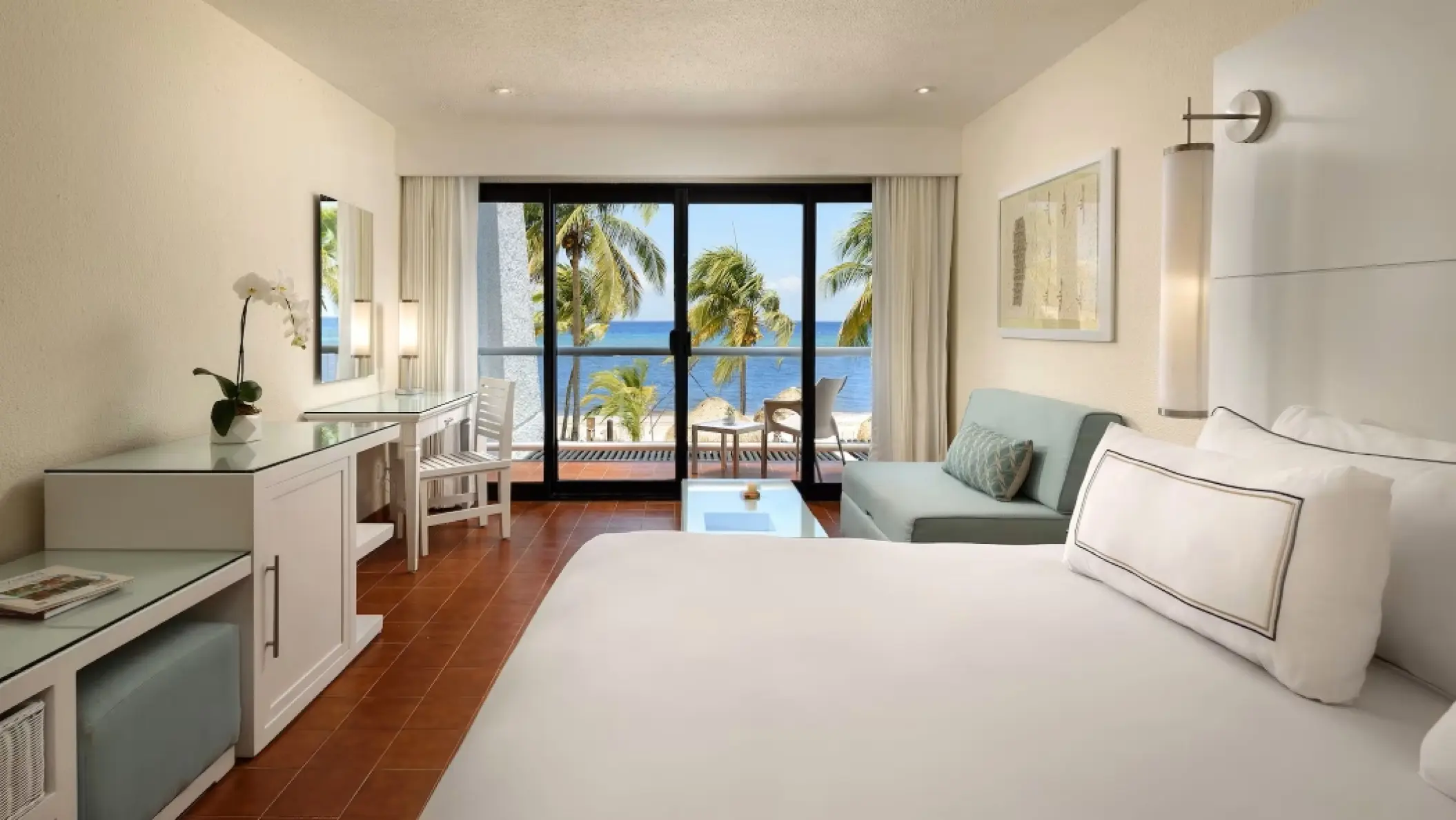 Ocean-view suite with balcony overlooking the beach at Melia Cozumel, Cozumel