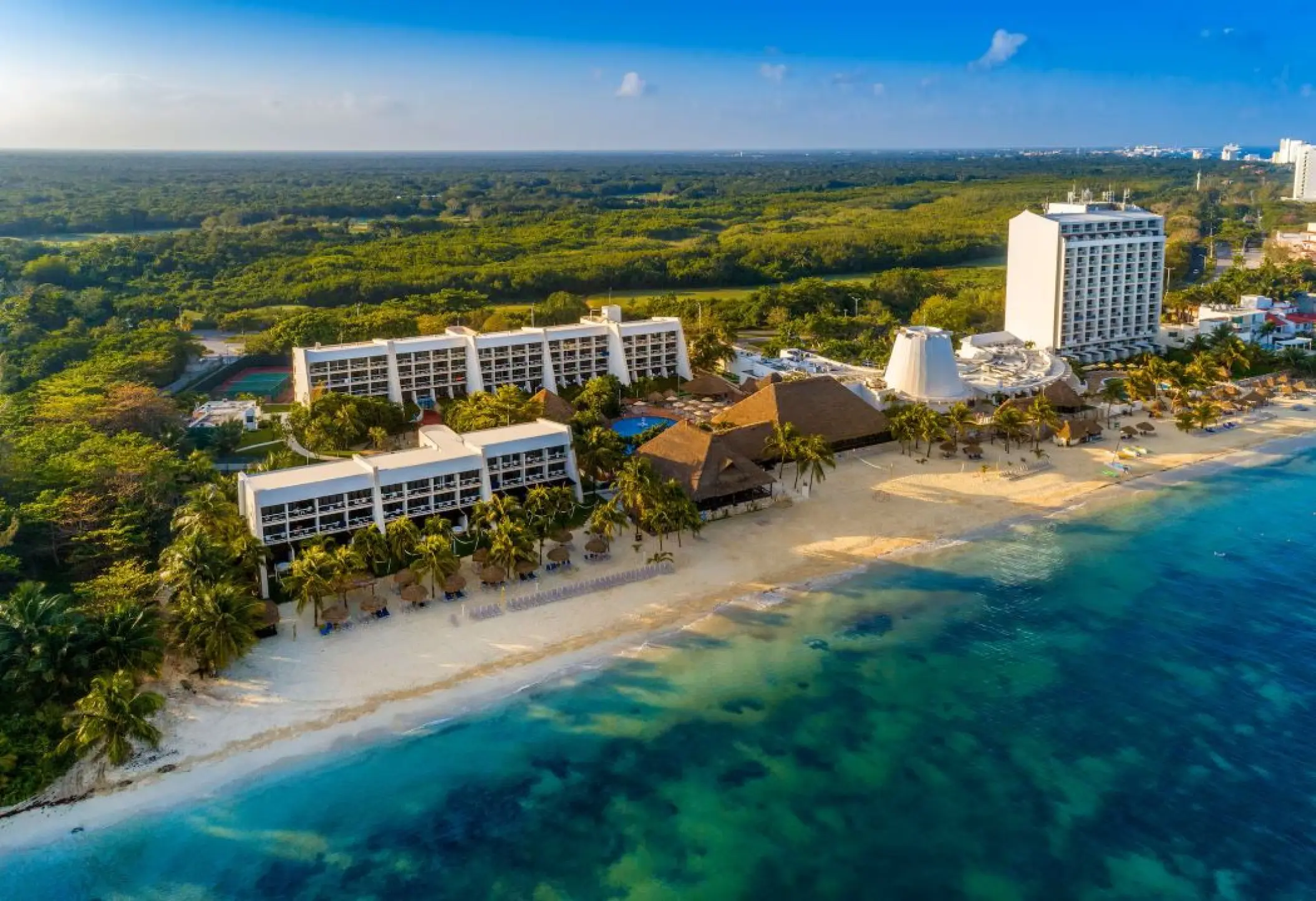 Aerial view of Melia Cozumel buildings and white sand beach, Cozumel
