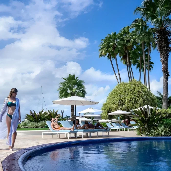 a woman by the pool at Moon Palace Jamaica