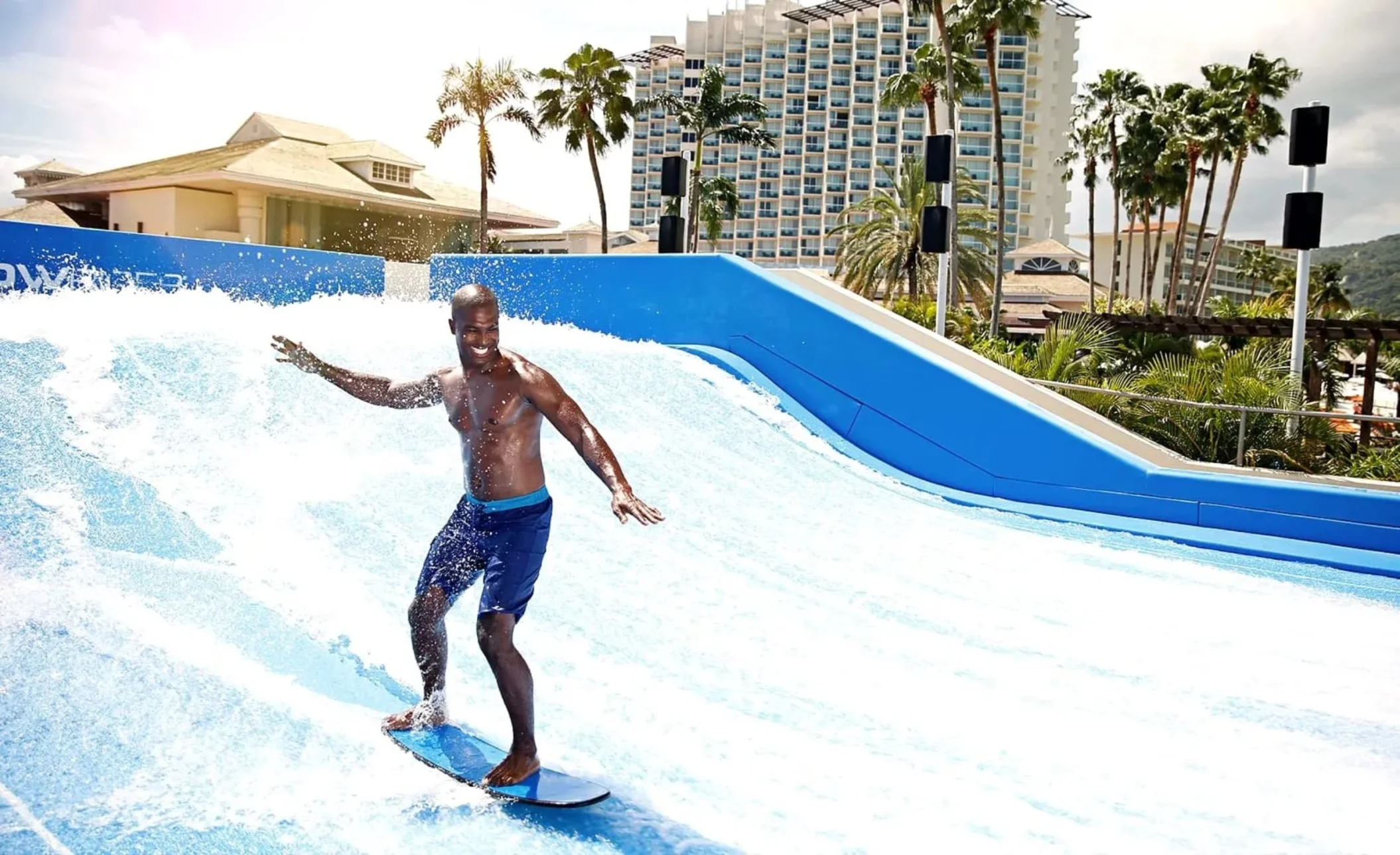 guest trying the flowrider at Moon Palace Jamaica