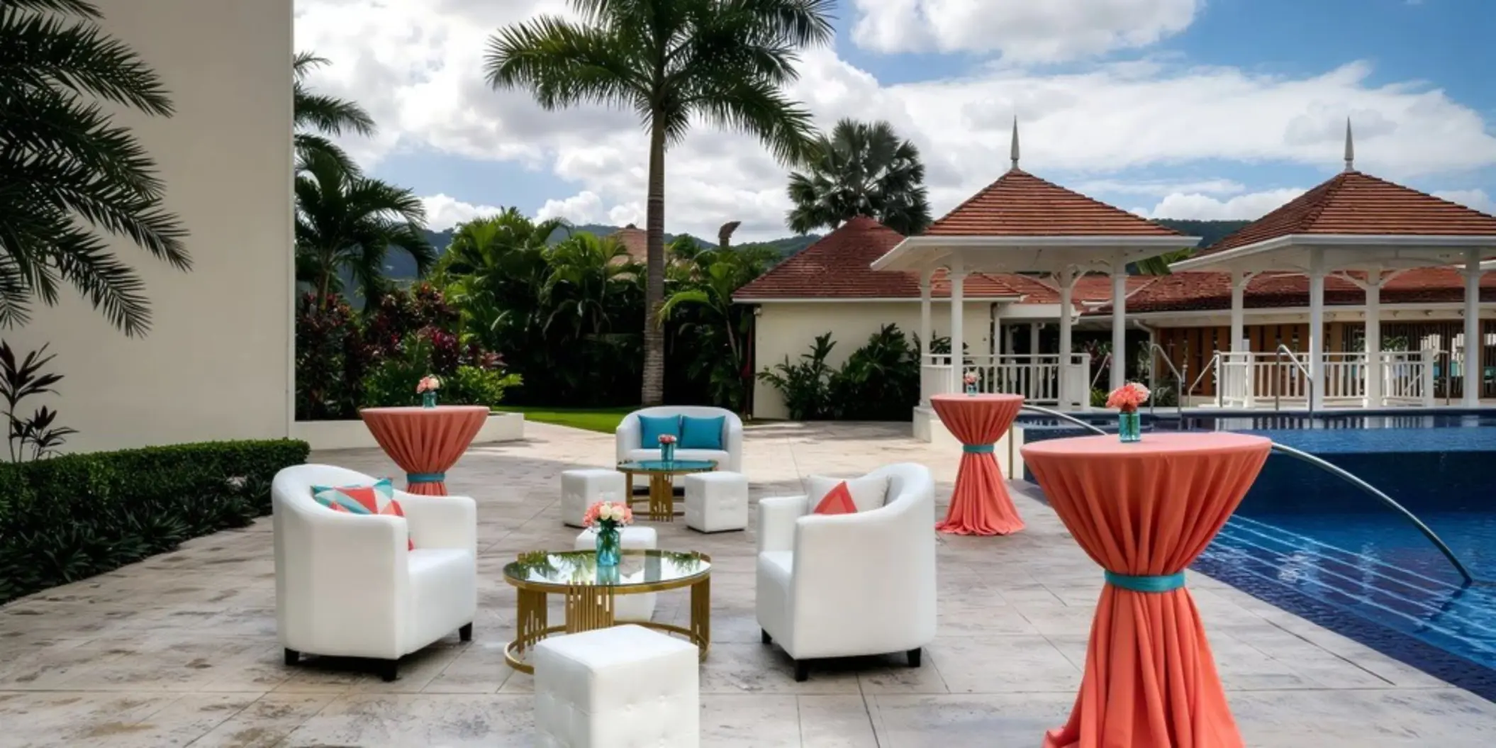 Pier 8 terrace wedding reception setup by the pool at Moon Palace Jamaica, Ocho Rios