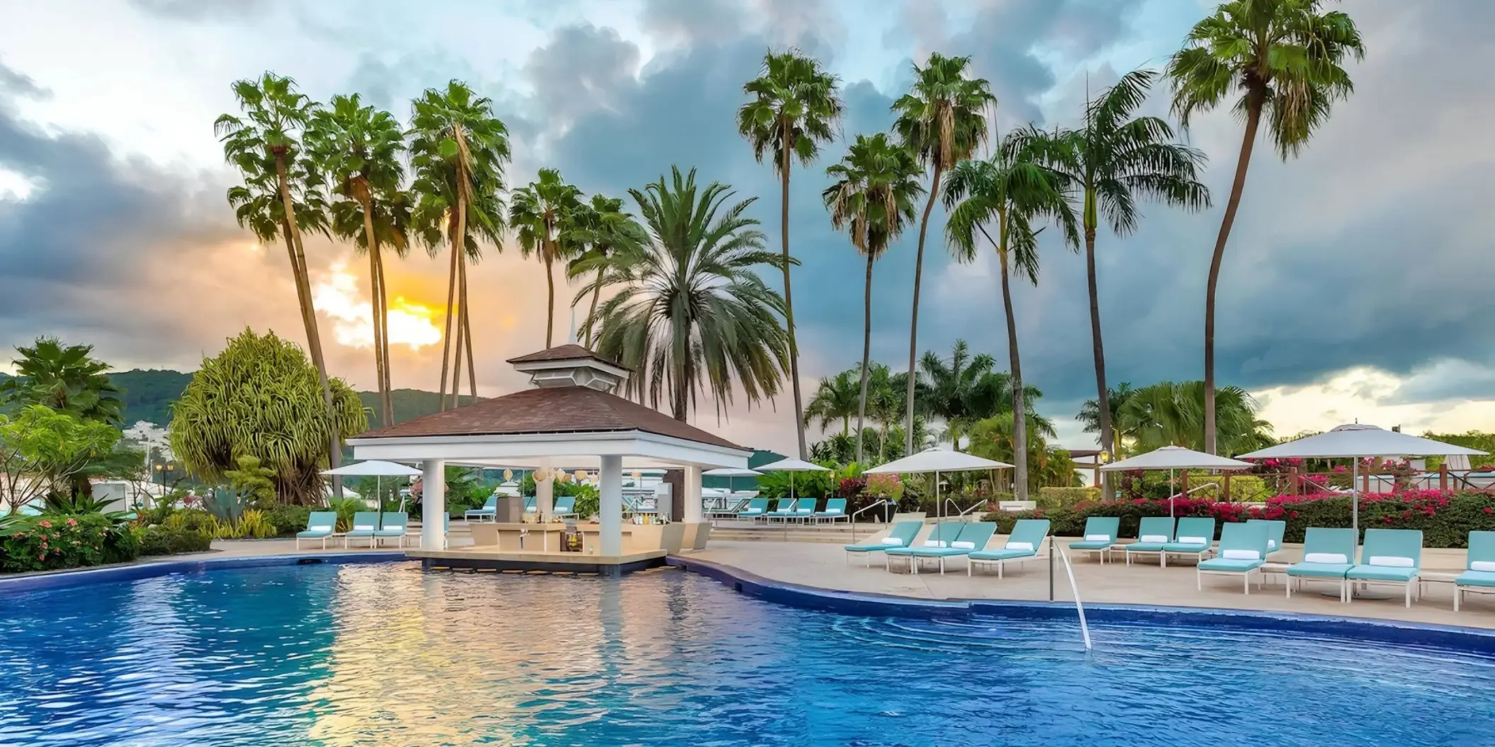 Moon Palace Jamaica swimming pool and swim-up bar at sunset, Ocho Rios