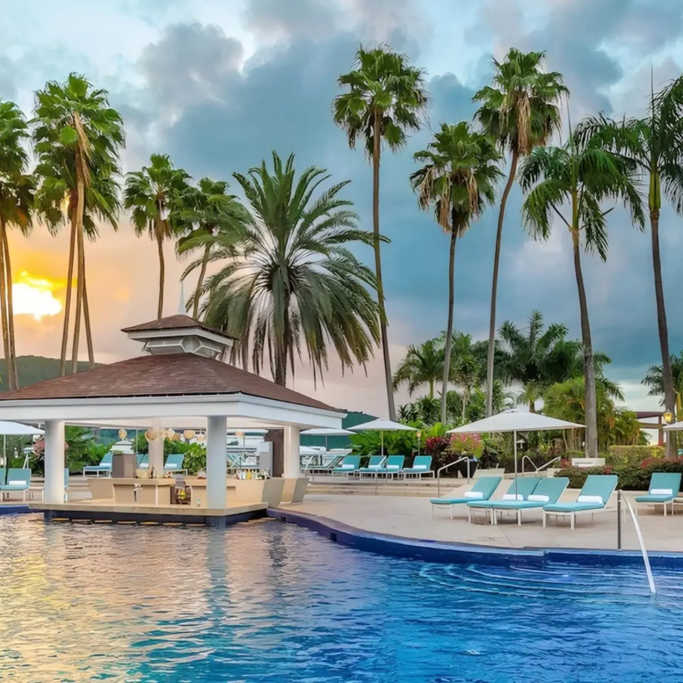 Moon Palace Jamaica swimming pool and swim-up bar at sunset, Ocho Rios