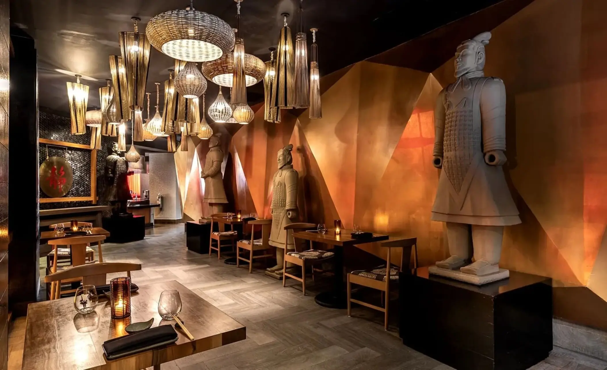 Momo Asian restaurant dining room with terracotta warrior statues at Moon Palace Jamaica, Ocho Rios