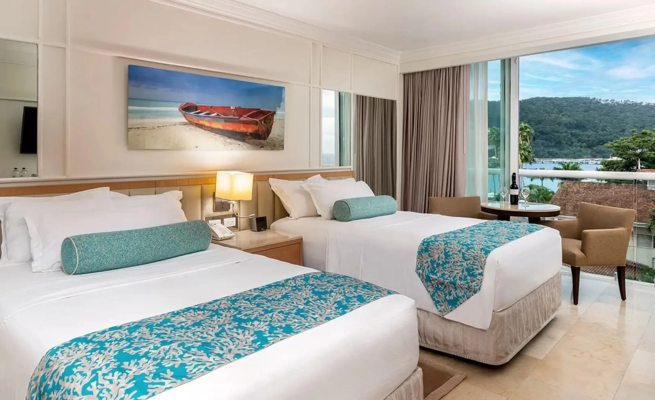 Guest suite with two beds and a balcony at Moon Palace Jamaica, Ocho Rios